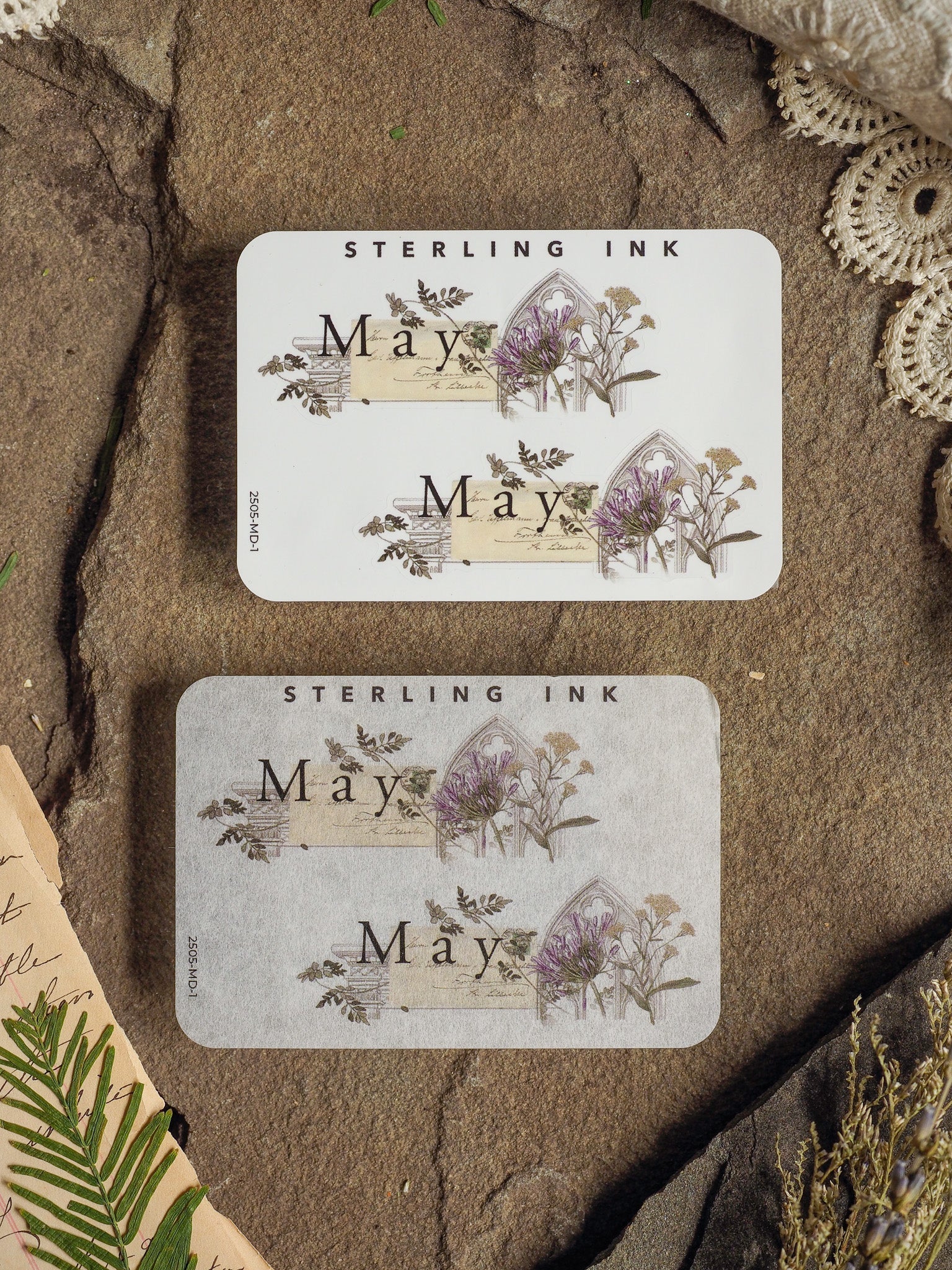 Decorative "May" month planner stickers from Sterling Ink, featuring elegant purple floral and botanical illustrations suitable for journaling or scrapbooking.