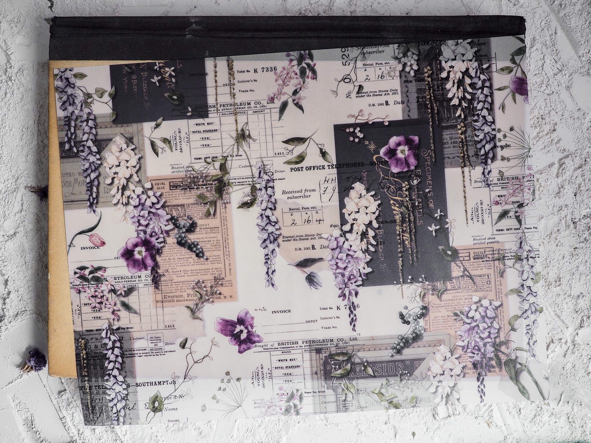 Vintage ephemera design featuring stacked, detailed invoices and receipts interwoven with decorative clusters of purple wisteria flowers and greenery.