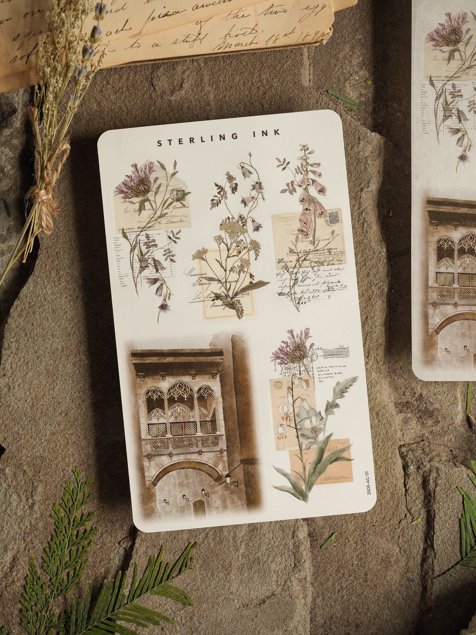 Vintage botanical sticker labeled "Sterling Ink," showcasing detailed drawings of wildflowers, herbs, and classical architectural elements.