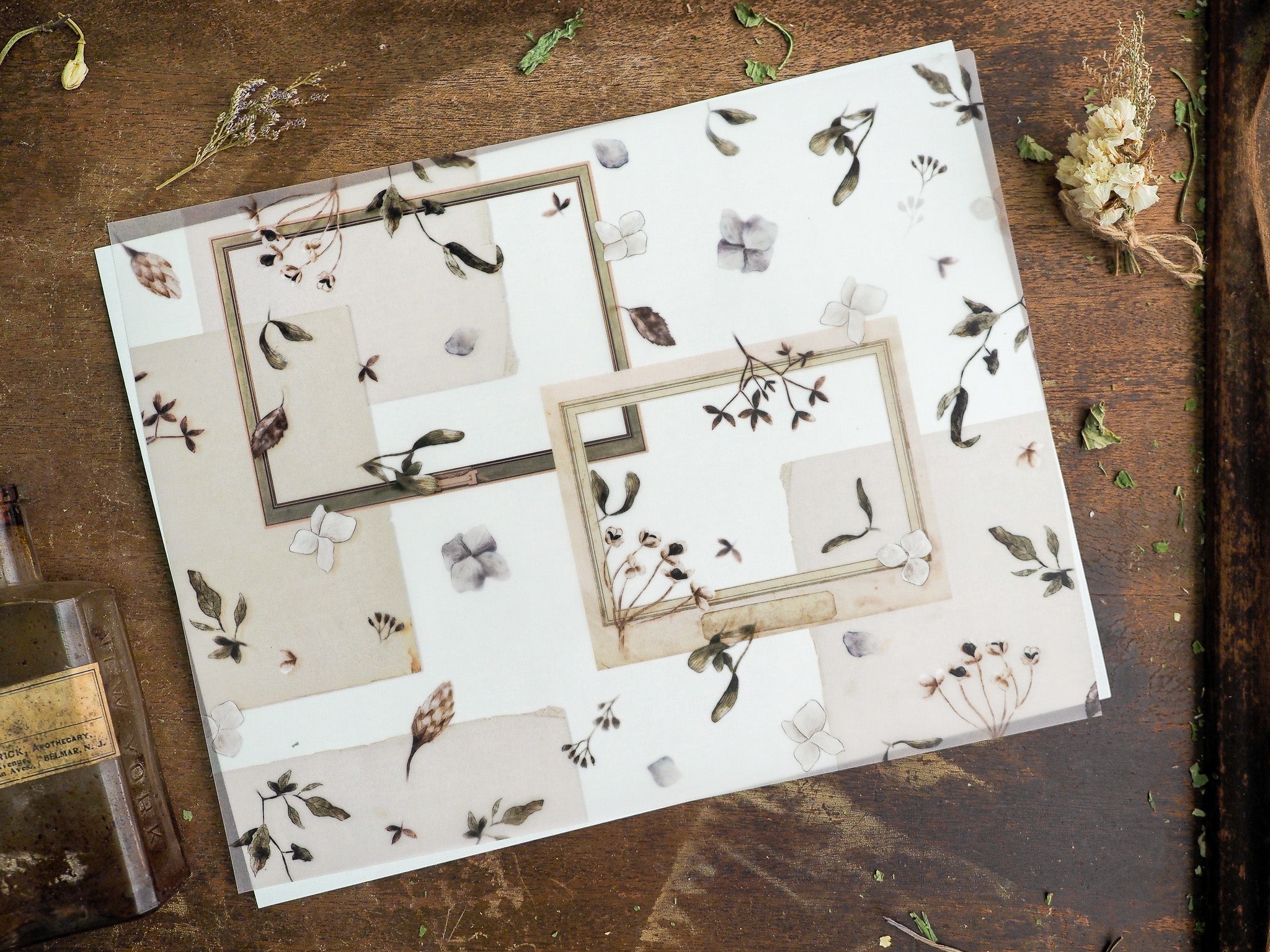 Delicate botanical sticker sheets featuring pressed leaves, small blossoms, and rustic floral arrangements in muted, vintage, cream tones.