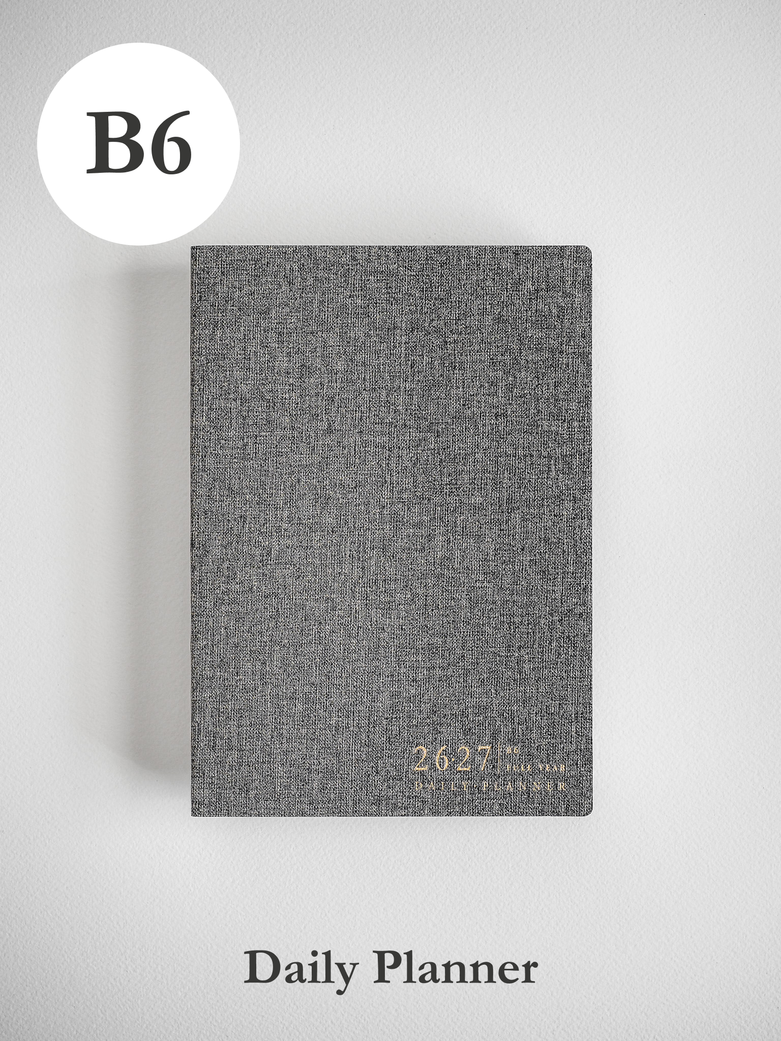 Stylish B6 academic daily planner with a textured dark gray cover featuring gold foil text for the 2026-2027 academic year.