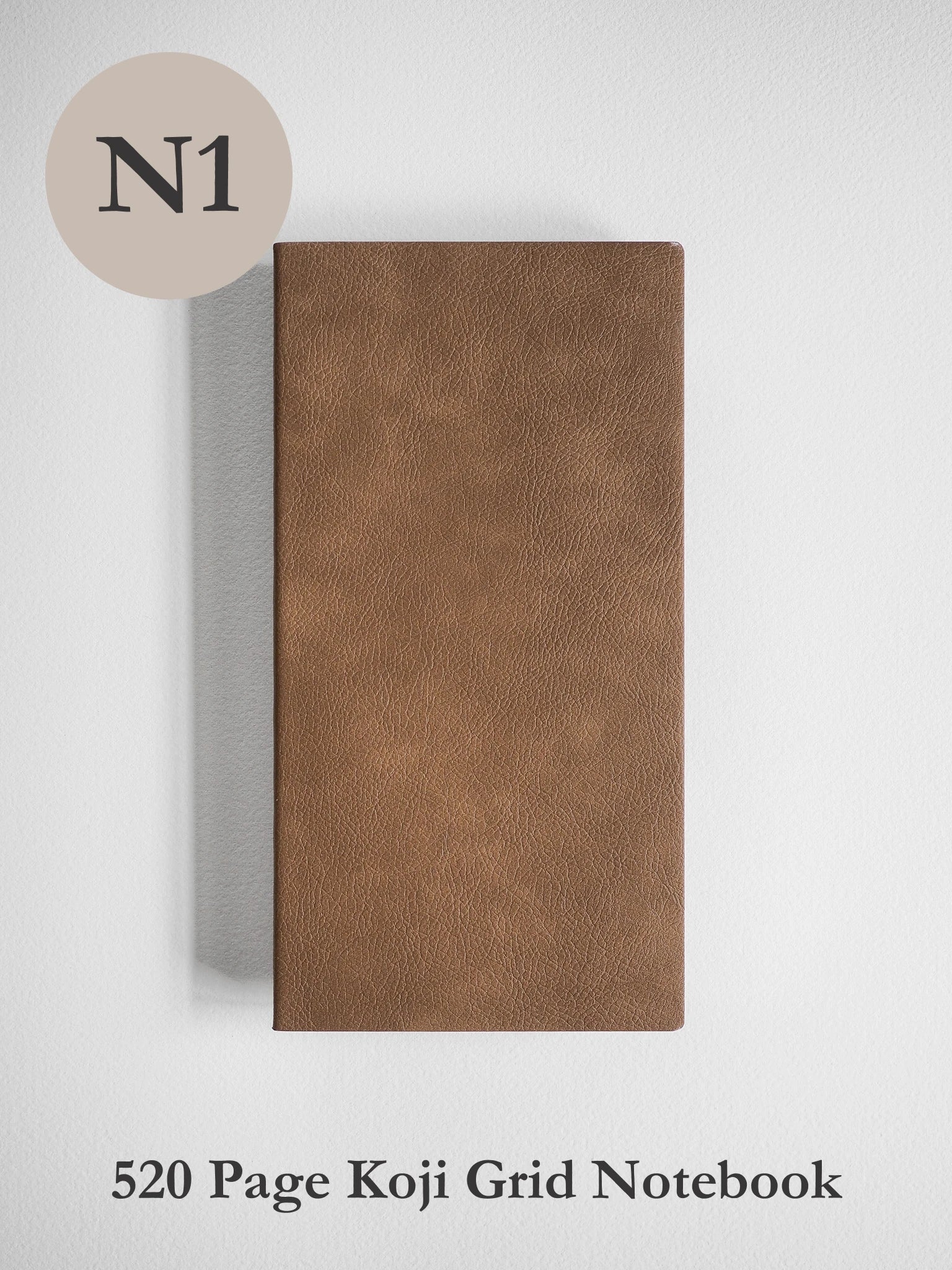 Brown notebook with textured cover on a white background
#Color_Caramel