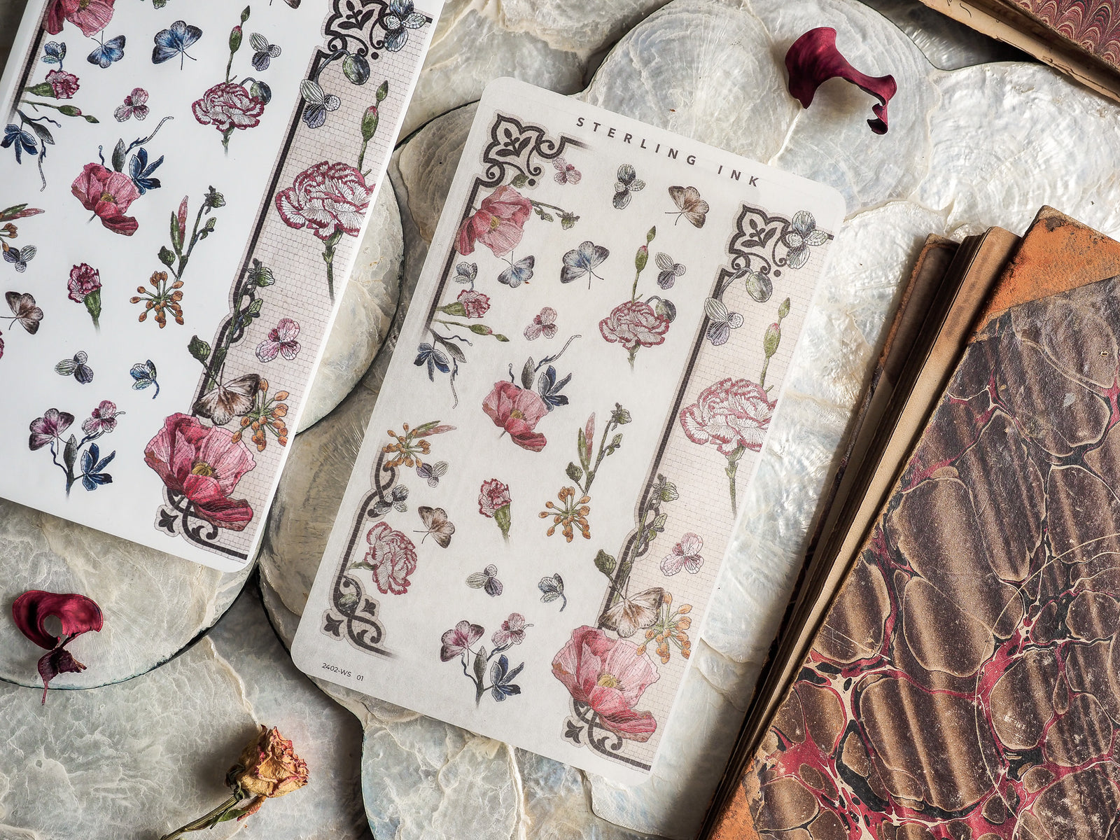 Botanical washi strip sticker featuring delicate clusters of pink and red roses, various leaves, and small wildflower illustrations for journaling and crafting.