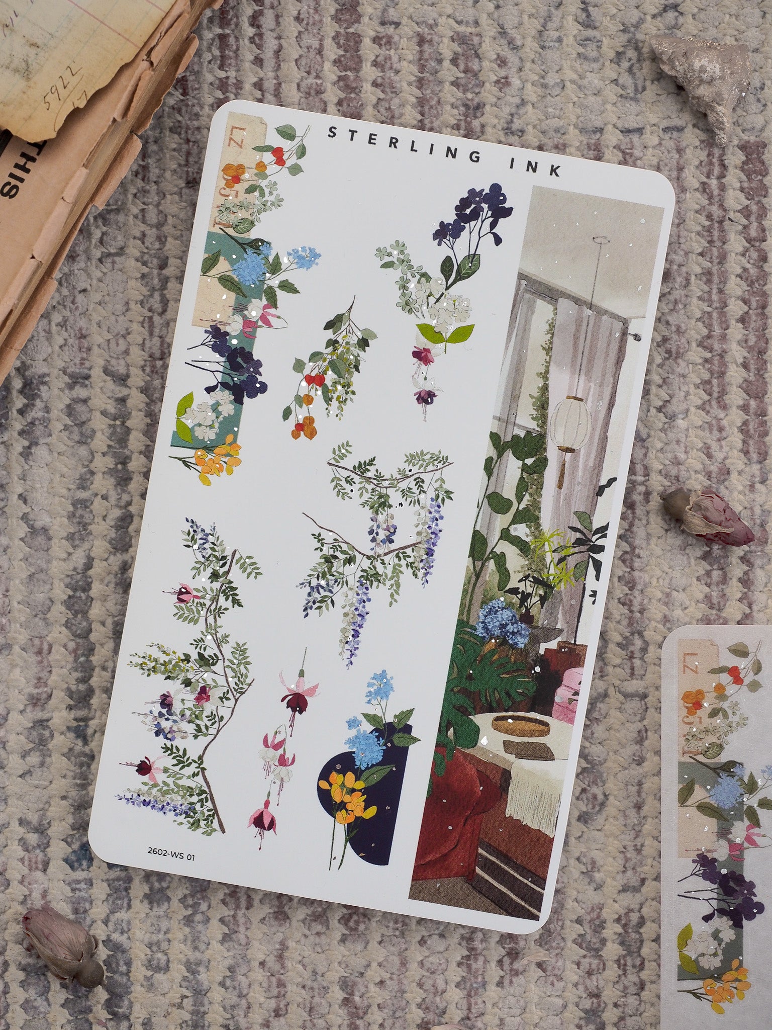 Decorative washi stickers featuring delicate watercolor florals and a charming scene of blooming indoor potted plants for journaling and scrapbooking.