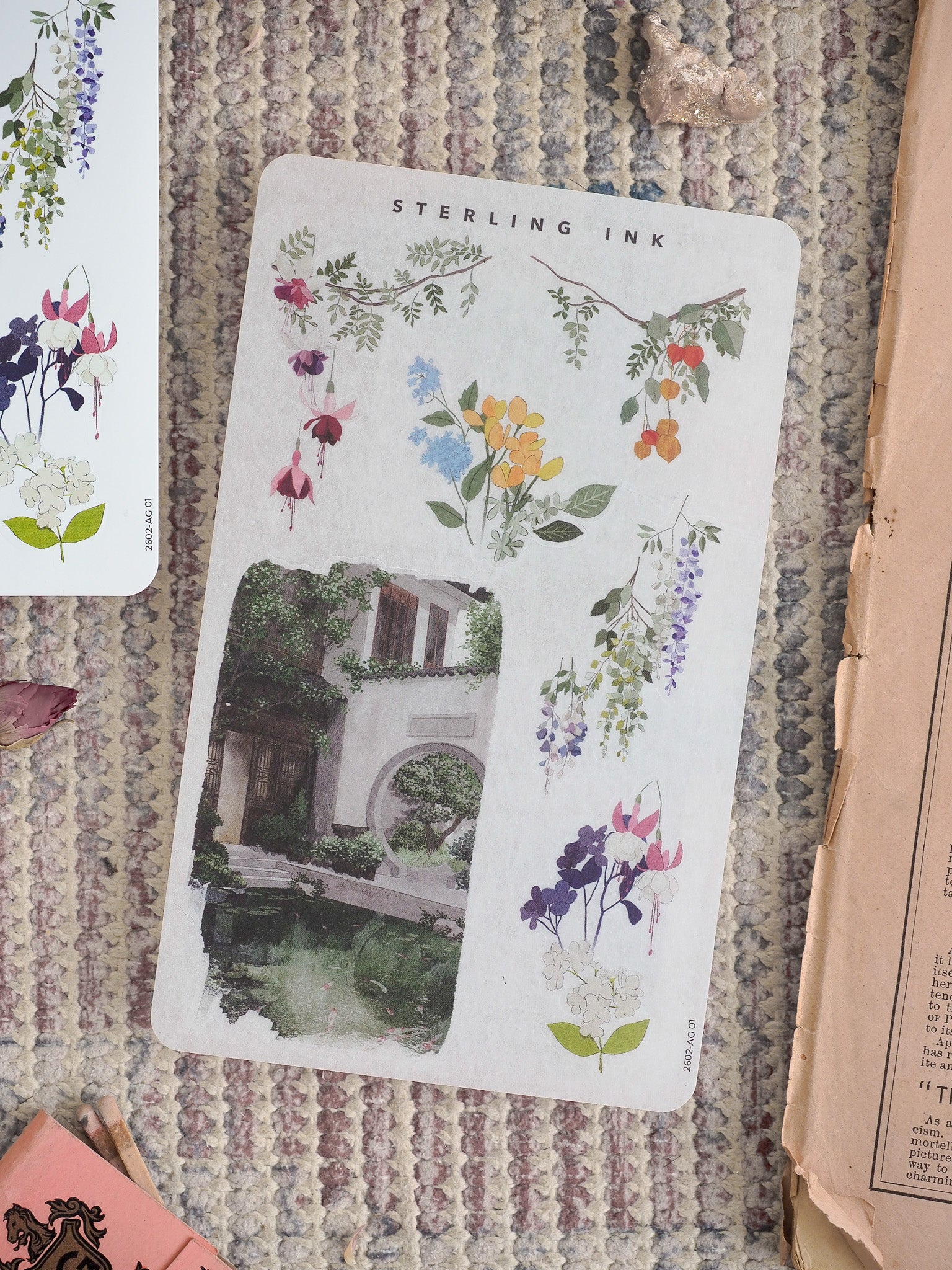 Decorative sticker sheet with a romantic botanical theme, featuring watercolor floral clusters and a detailed illustration of a vine-covered garden archway.