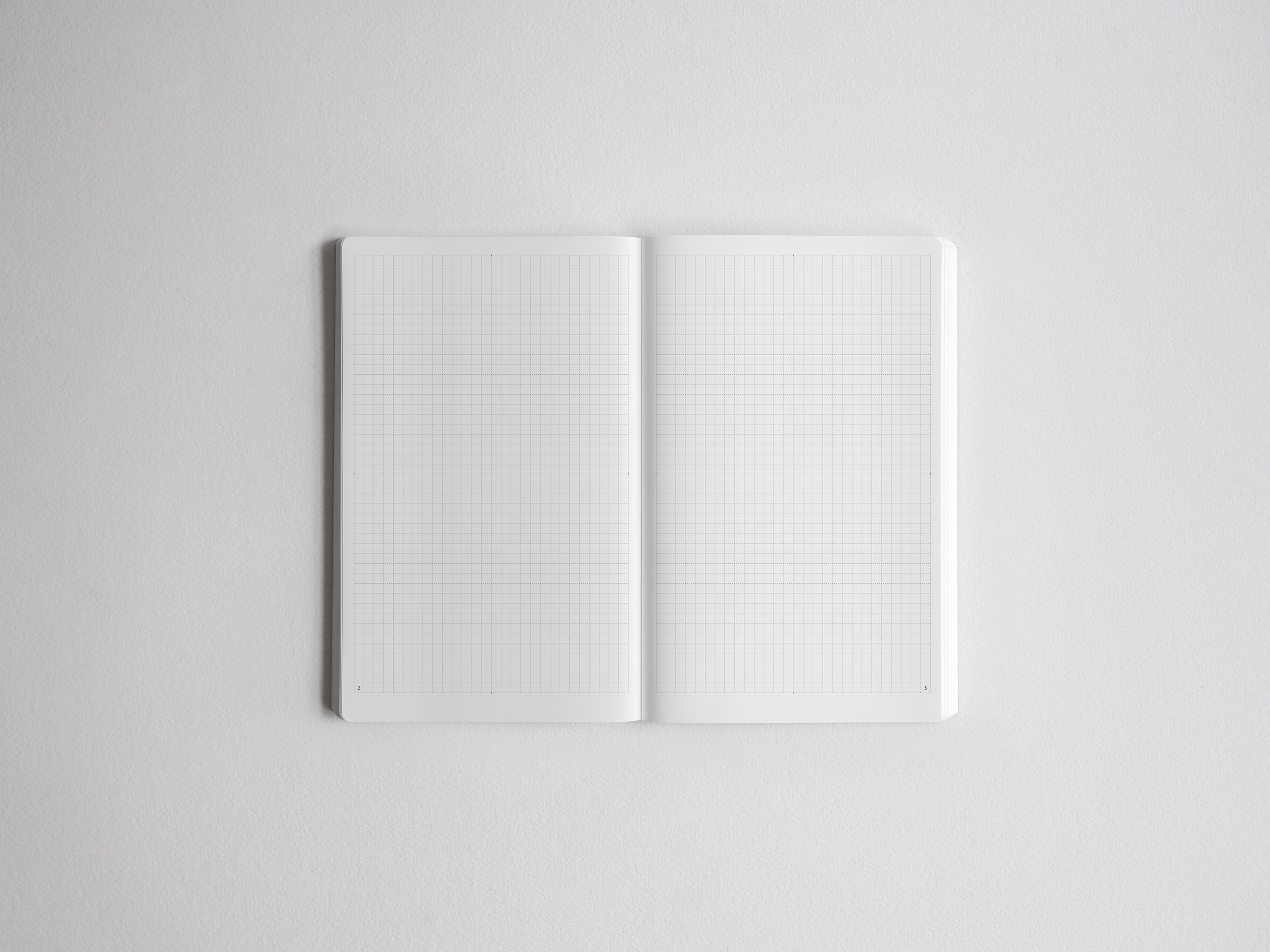 Open B6 grid notebook featuring perfectly aligned white pages with precise graph lines, ideal for detailed note-taking, drafting, or technical sketching.