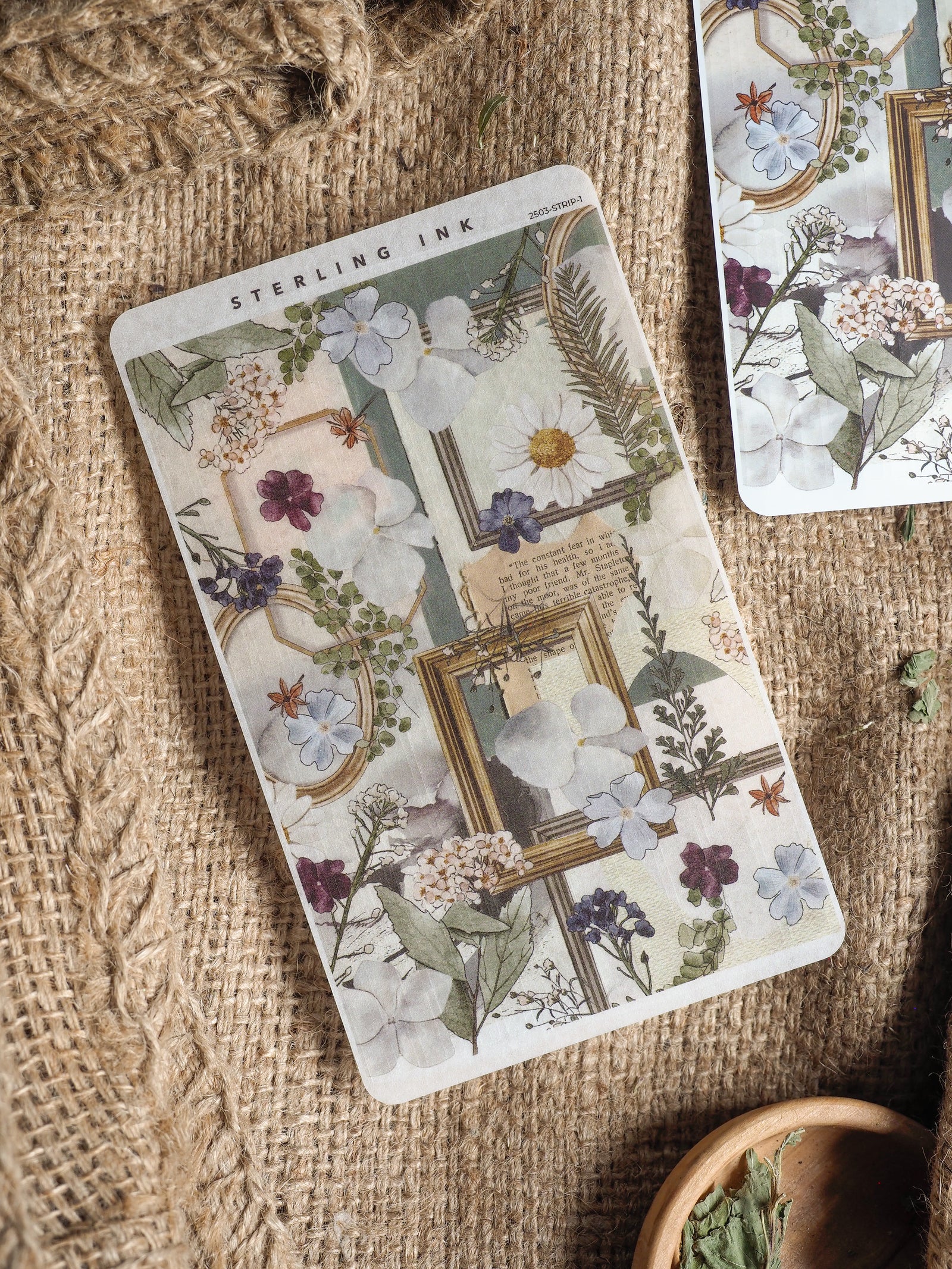 Delicate floral and botanical sticker strip featuring soft pastel wildflowers, lush green foliage, and vintage gold frames in a romantic, vintage pattern.