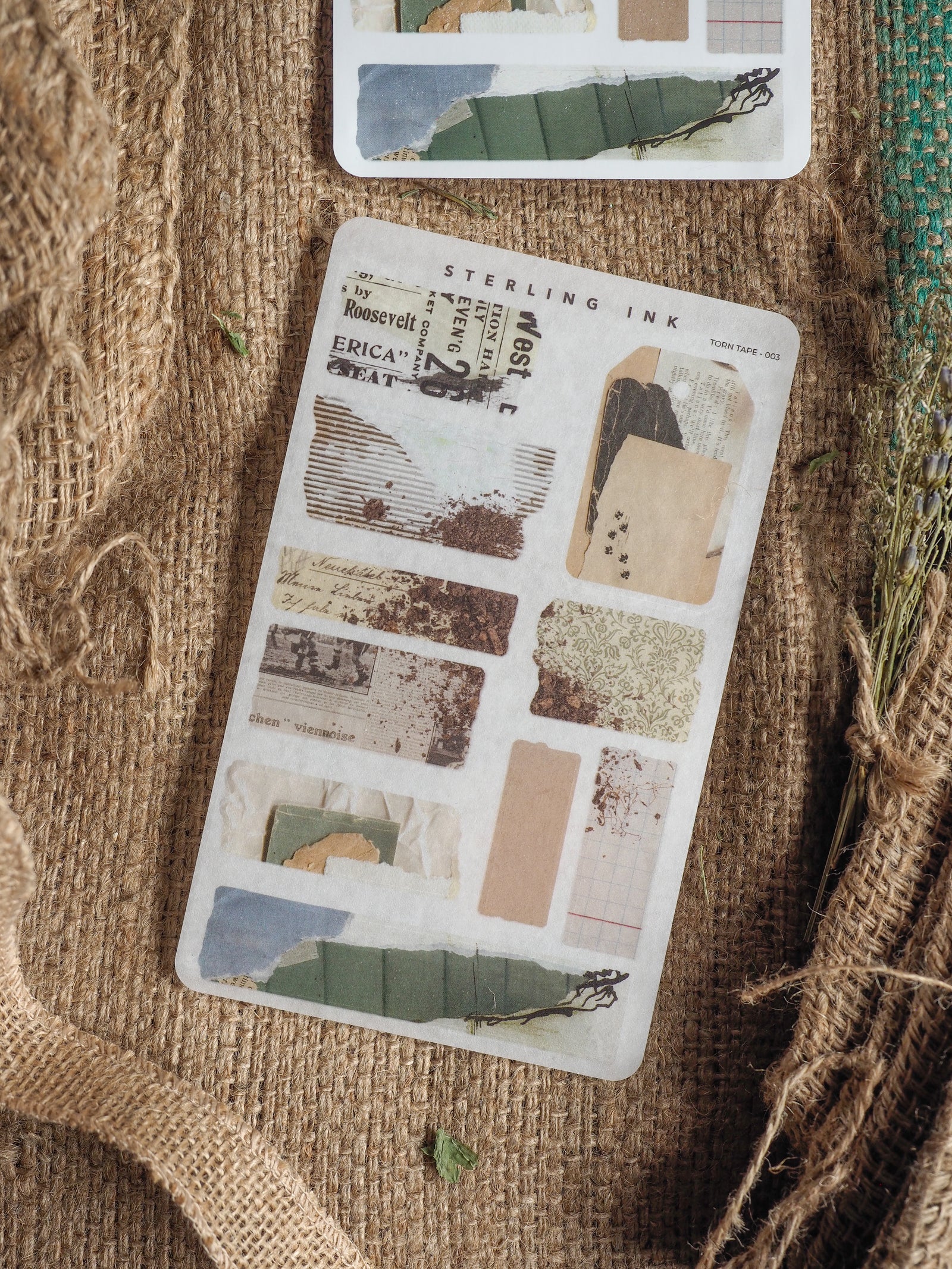 Scrapbook sticker tape featuring distressed, archival elements, sepia tones, muted blues, and textured vintage paper designs for journaling.