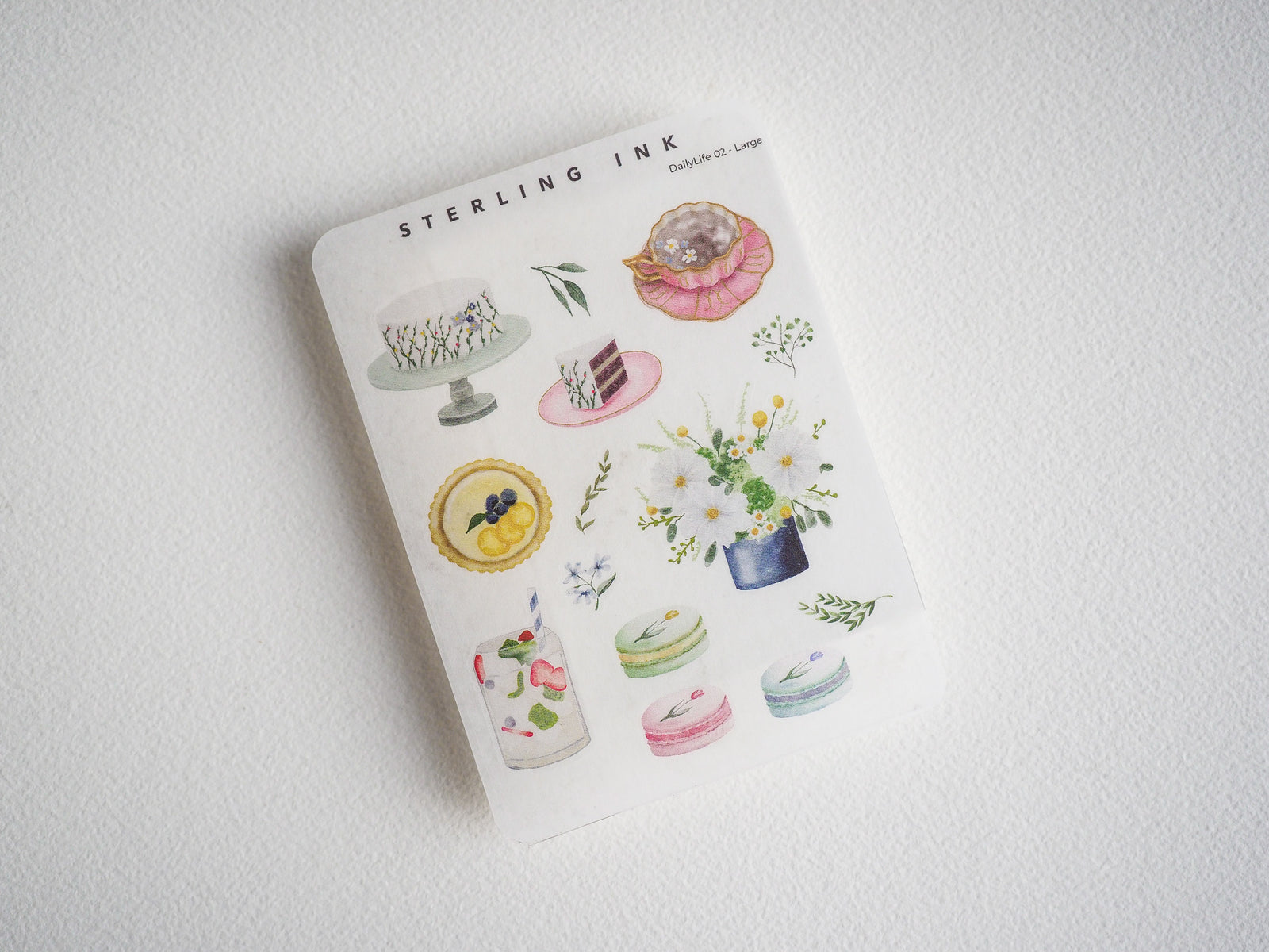 Watercolor sticker set: Macarons, tiered cakes, floral bouquets, and cute pastel dessert illustrations perfect for