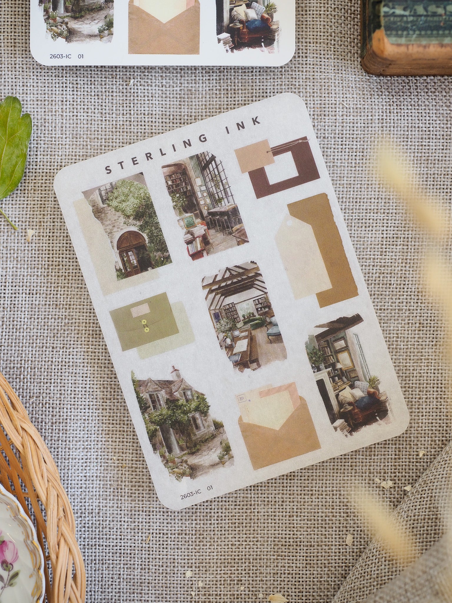 Detailed sticker sheet showcasing architectural elements, including miniature houses, arched entryways, and neutral cream-colored icon boxes for journaling and planning.