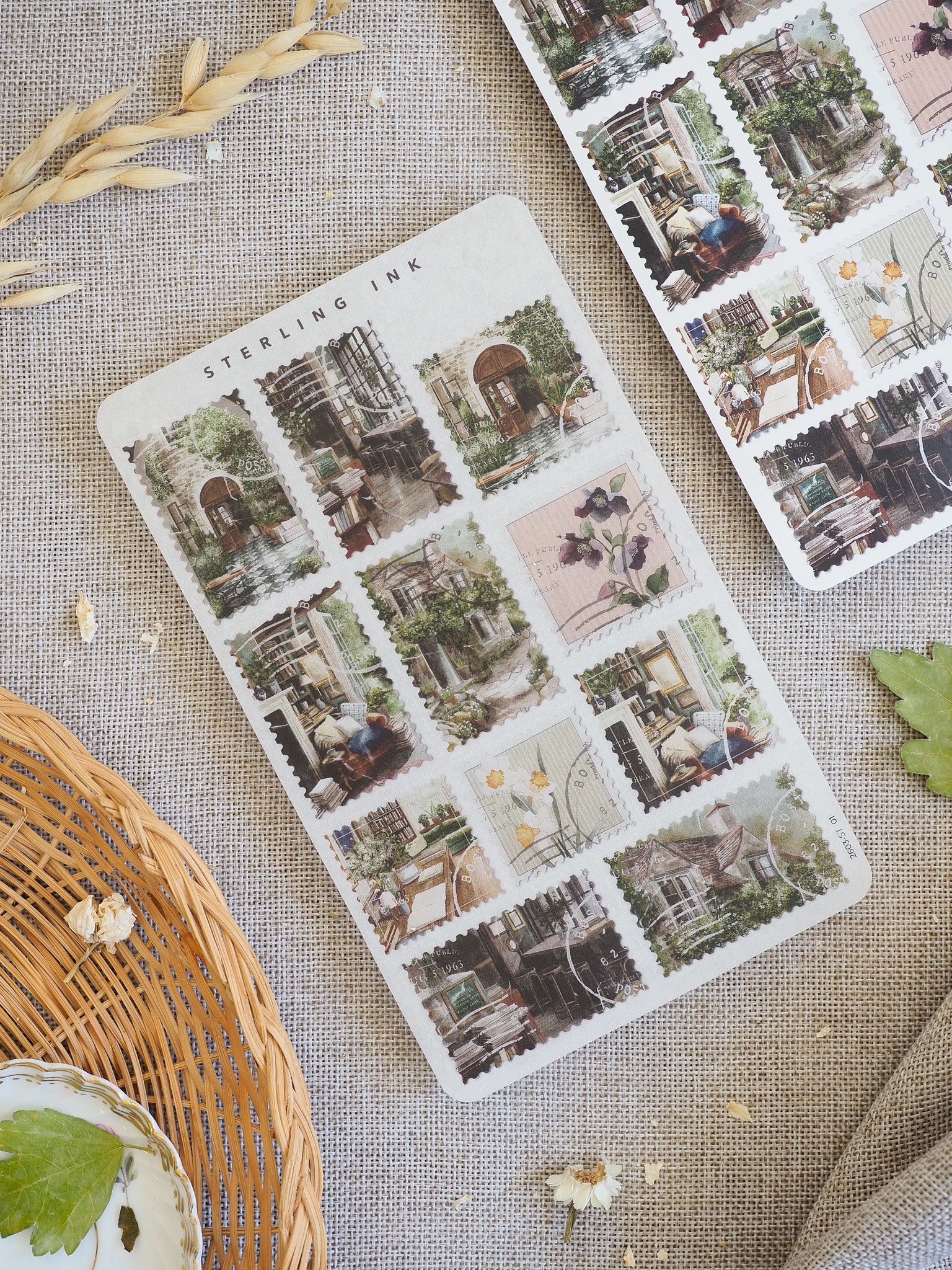 Vintage collection of "Stamps Stickers - March 2026," featuring various square vignettes of charming, overgrown European street scenes and quaint shop fronts.