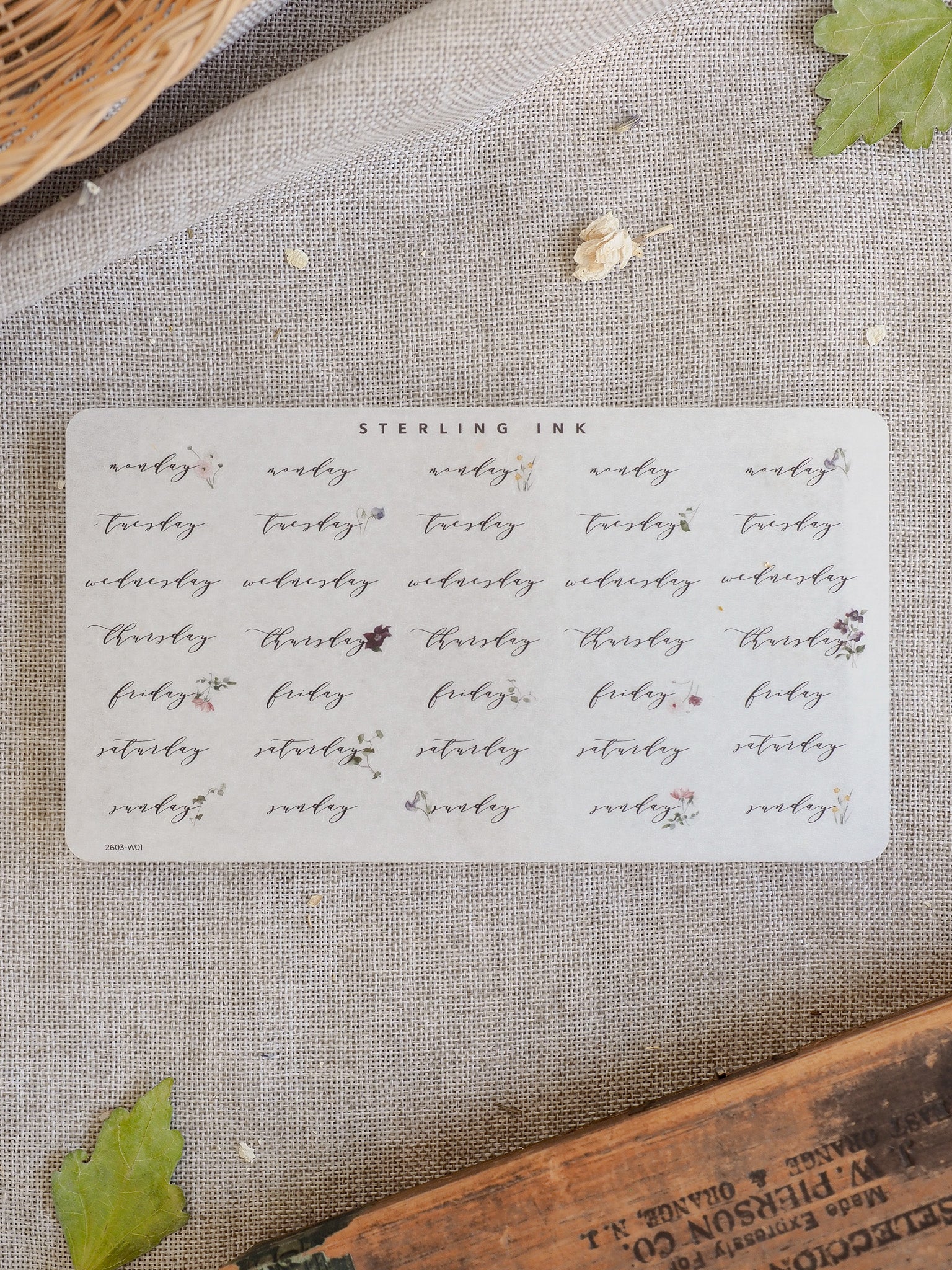 Weekly planning sticker sheet featuring elegant black labels for every day, from Monday through Sunday, perfect for organizing academic schedules or journaling.