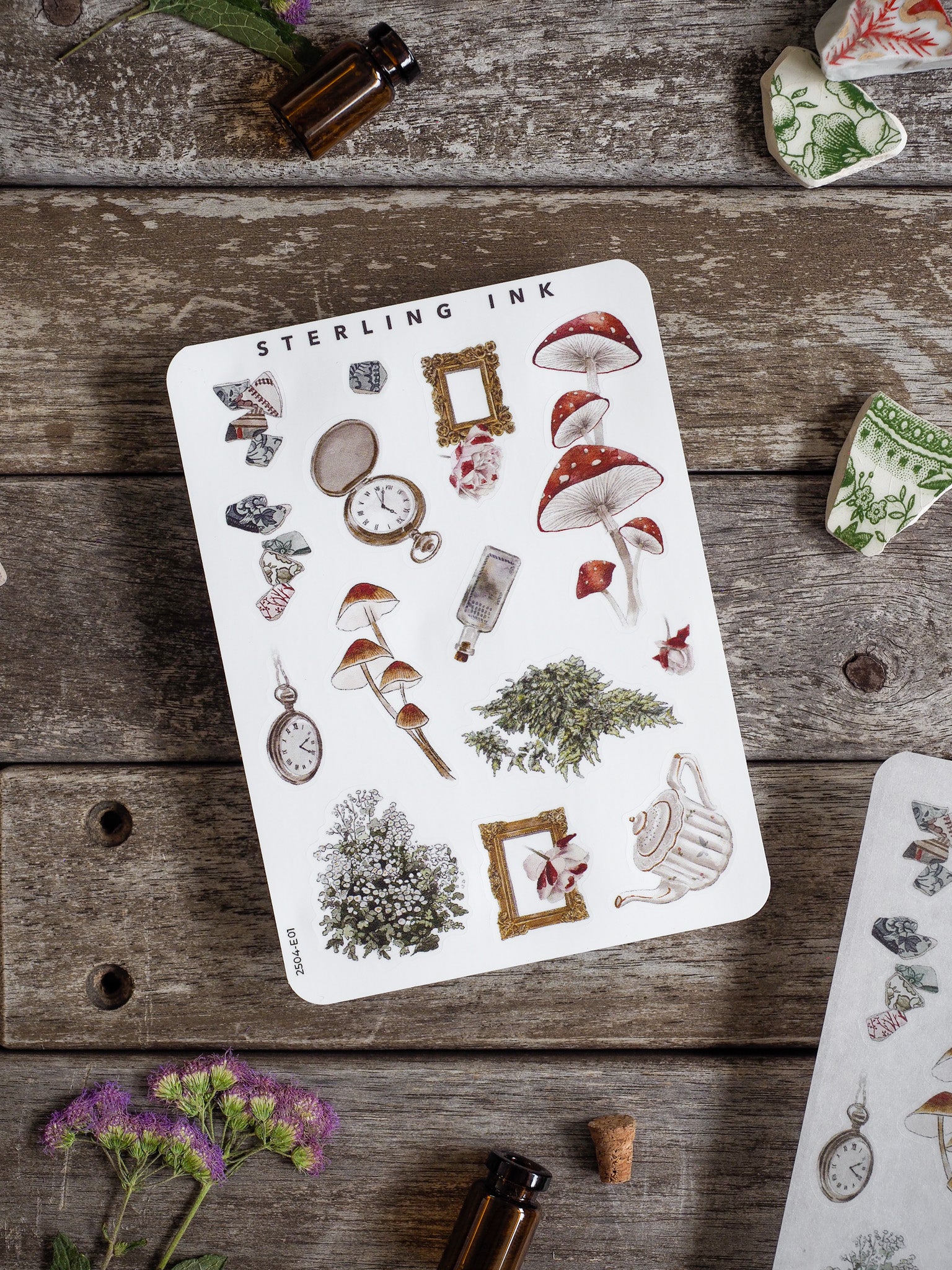 A detailed, watercolor sticker set depicting natural elements like whimsical mushrooms, antique clocks, foliage, and apothecary items.