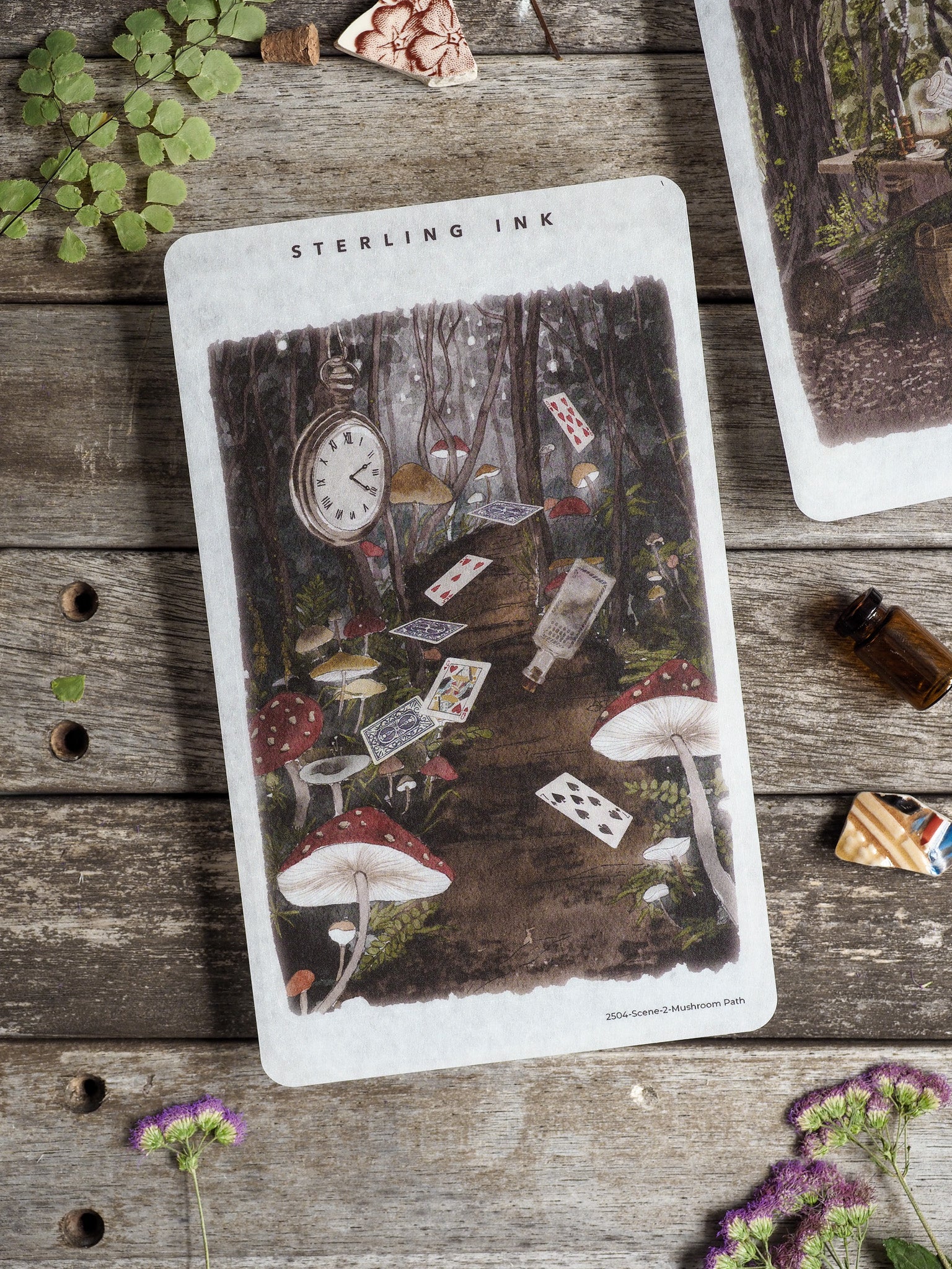 Detailed forest sticker scene featuring a whimsical path, clusters of mushrooms, scattered playing cards, and deep woodland accents.