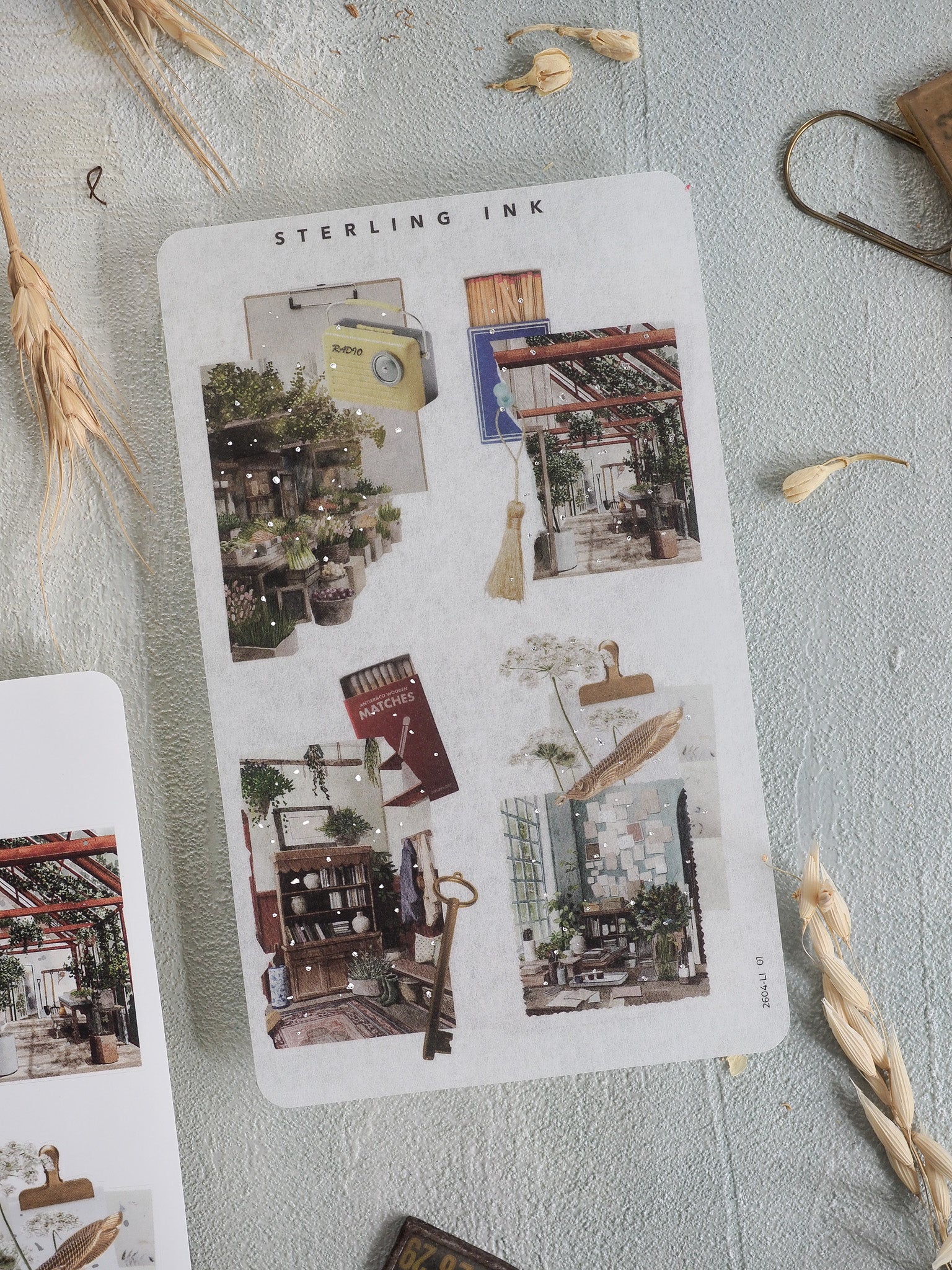 Decorative collage stickers featuring a rustic, vintage aesthetic with layered vignettes of shops, greenery, and natural elements for scrapbooking.