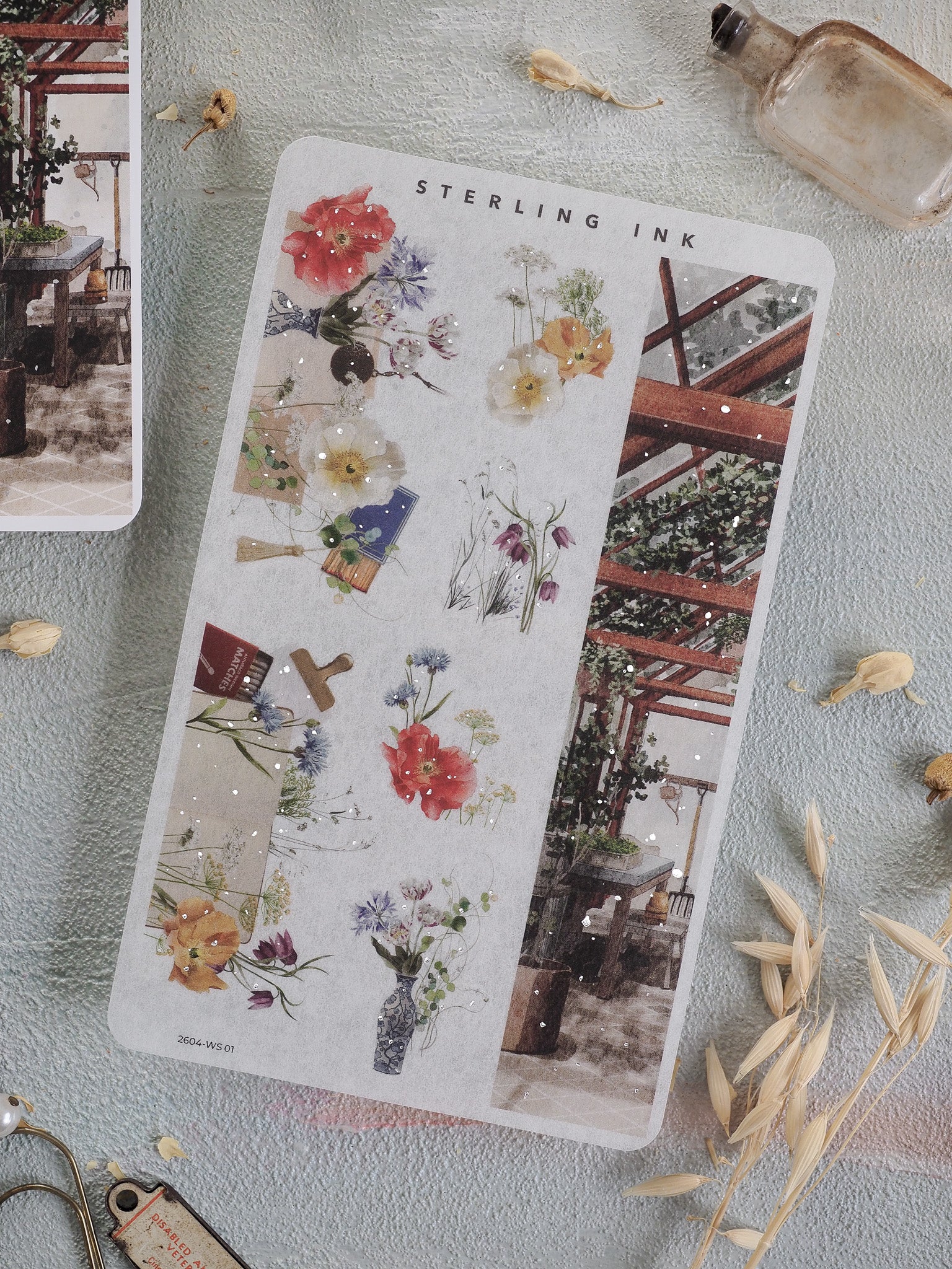 Delicate floral washi sticker sheet featuring a romantic mix of spring roses and wildflowers, accented with silver foil strips for planning and crafting.