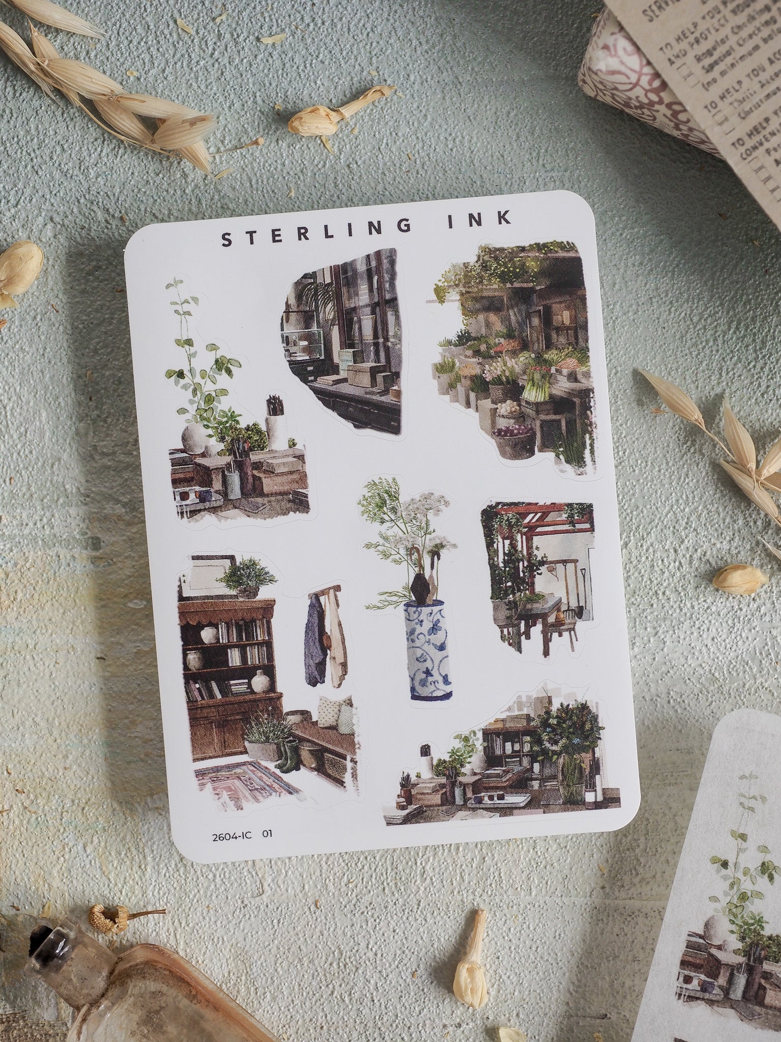 Watercolor sticker set featuring detailed illustrations of "Mini Elements," showcasing charming indoor scenes, potted plants, and vintage decorative objects.