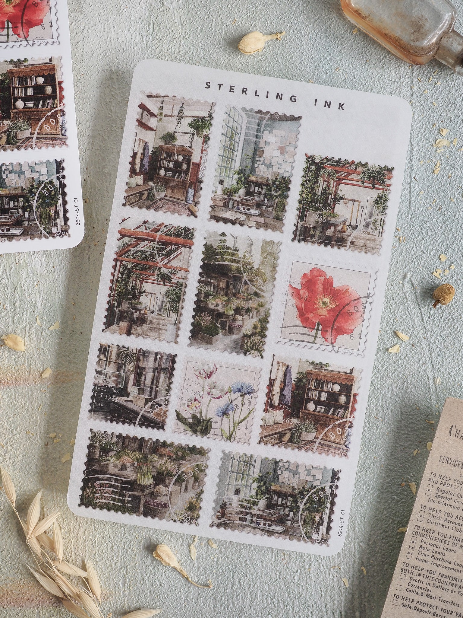 A beautiful sticker sheet featuring vintage illustrations of cozy European alleyways, detailed architecture, and delicate floral elements.