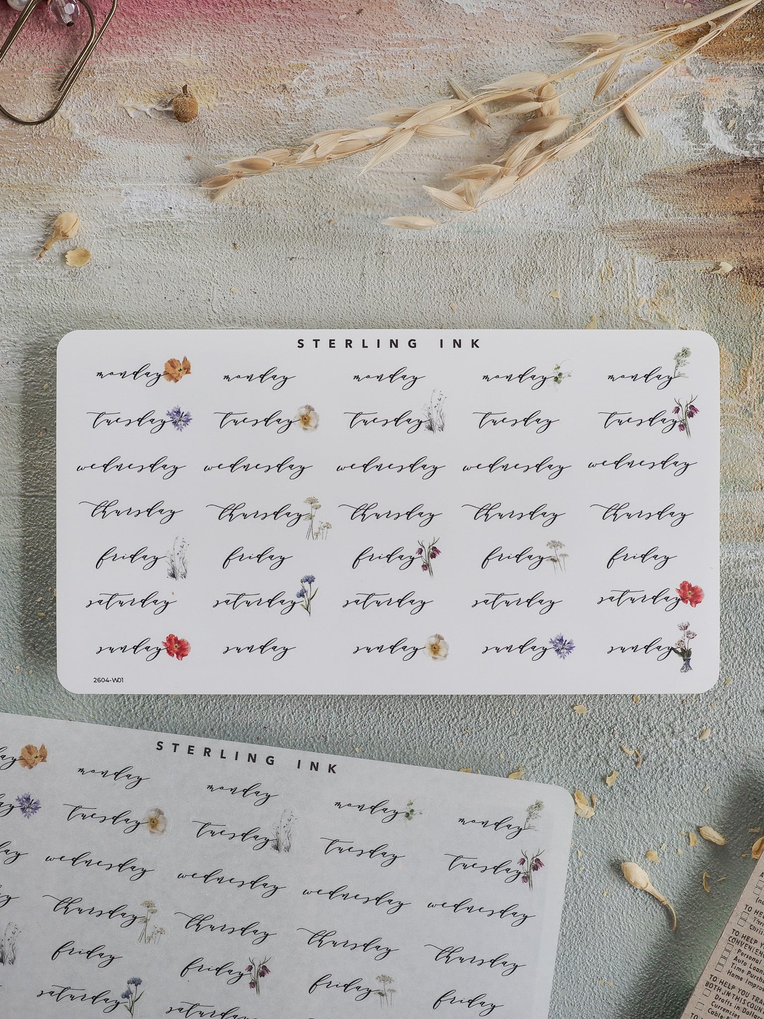 Detailed sticker sheet for April 2026, featuring daily and weekly date markers with a delicate, rustic botanical design for planning and journaling.