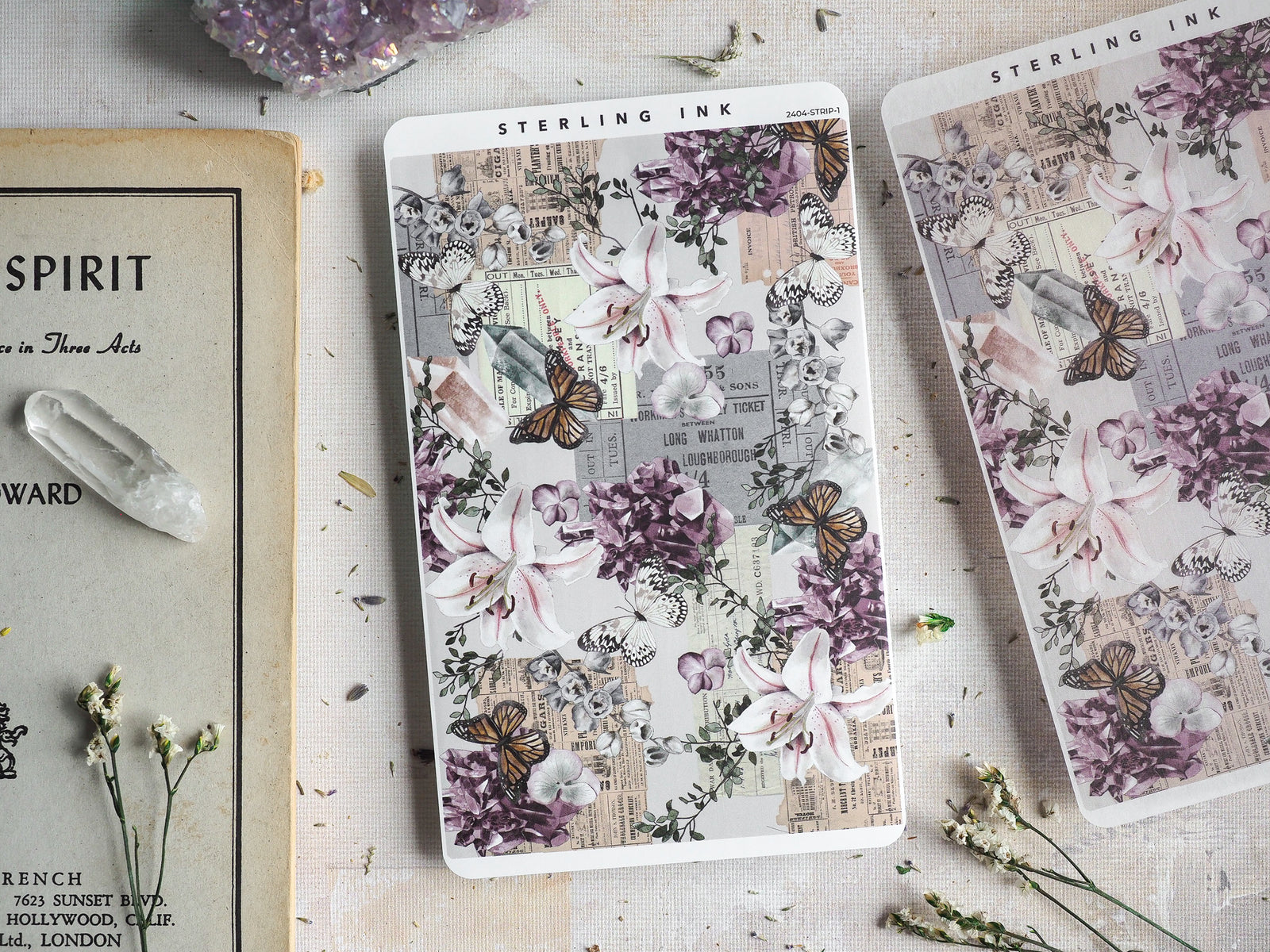 Intricate floral and butterfly-themed sticker strips featuring purple and white blossoms, decorative butterflies, and layered vintage textual elements.