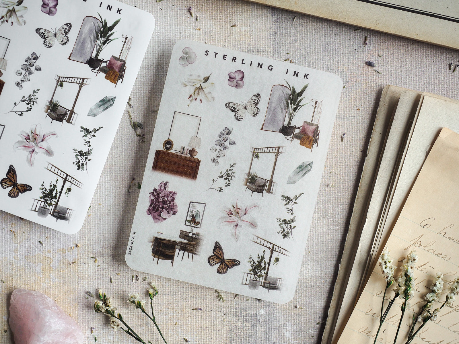 Vintage-themed sticker sheet featuring detailed, illustrated icons of spring florals, architectural elements, and butterflies in black ink.