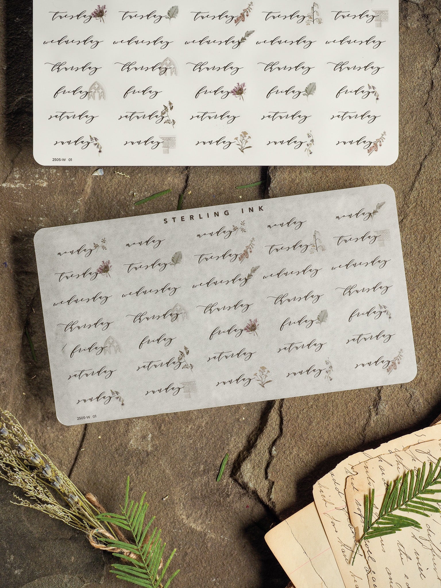 Delicate set of white weekly stickers featuring a repeating calendar pattern and elegant botanical accents, perfect for organizing and decorating planners for May 2025.