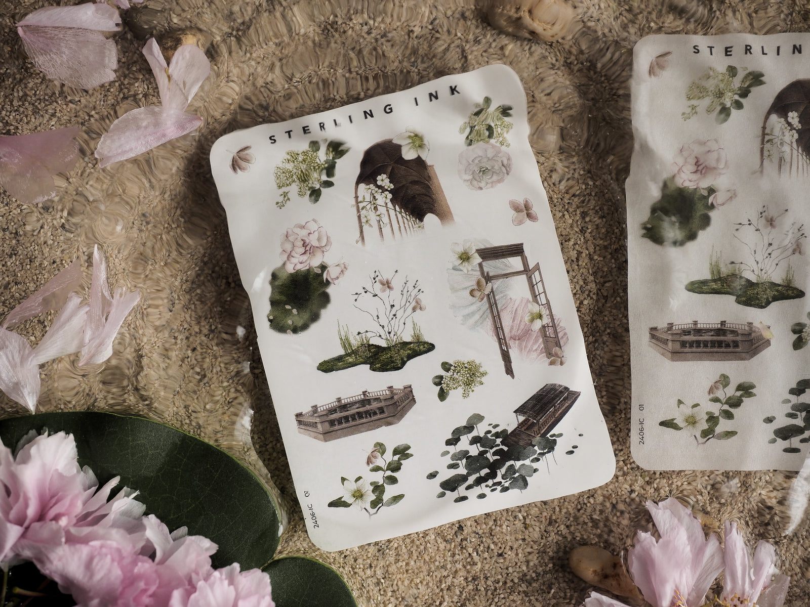 "Mini Elements Icon Stickers" sheet featuring delicate watercolor illustrations of architecture, flowers, and natural objects.