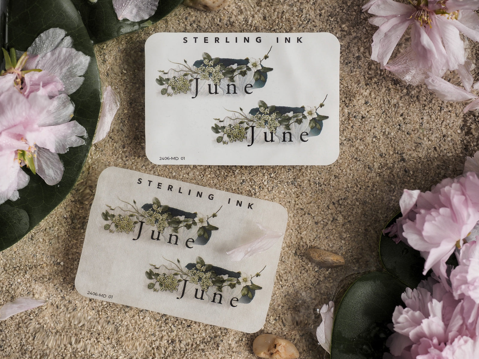 Elegant journaling stickers for June, featuring the month's name surrounded by detailed, muted green botanical and leafy garlands.