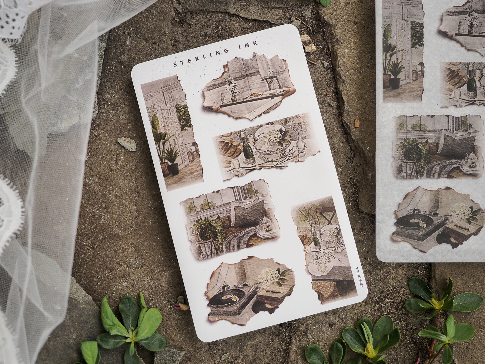 Sheet of vintage "Torn Paper Stickers" featuring sepia-toned die-cuts mimicking aged photographs of architectural details, potted plants, and rustic ephemera.