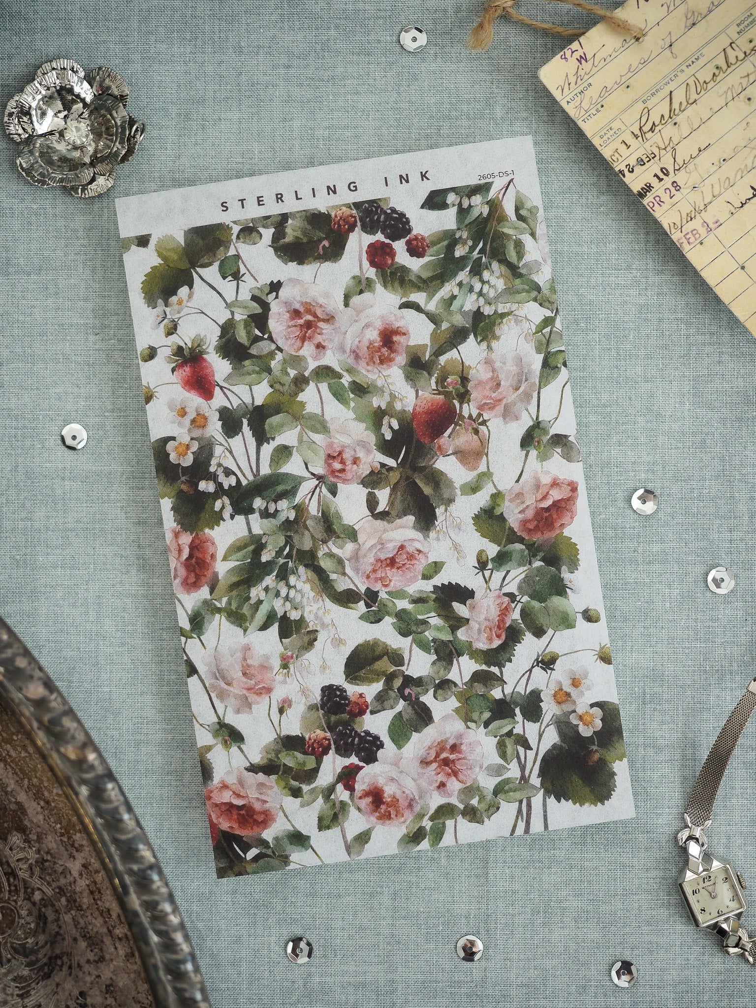 Detailed watercolor botanical pattern sticker featuring soft pink roses, lush greenery, and scattered dark berries.