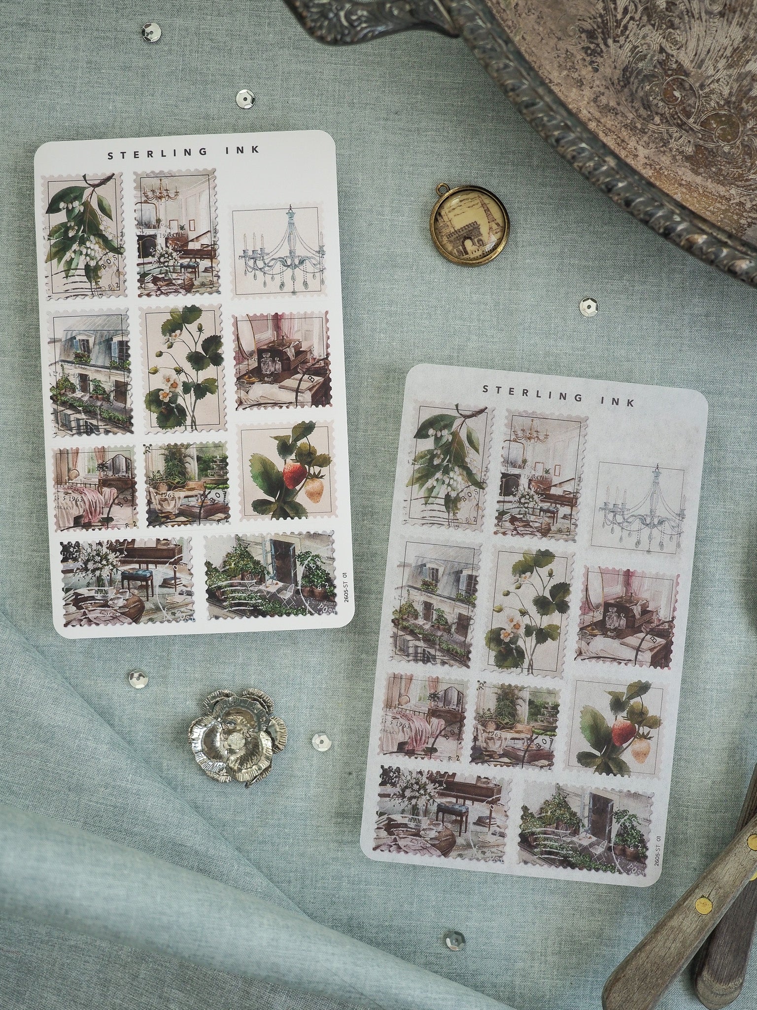 Vintage "Sterling Ink" sticker sheets featuring charming, detailed watercolor scenes of Parisian life, including elegant interiors, city streets, and lush European architecture.