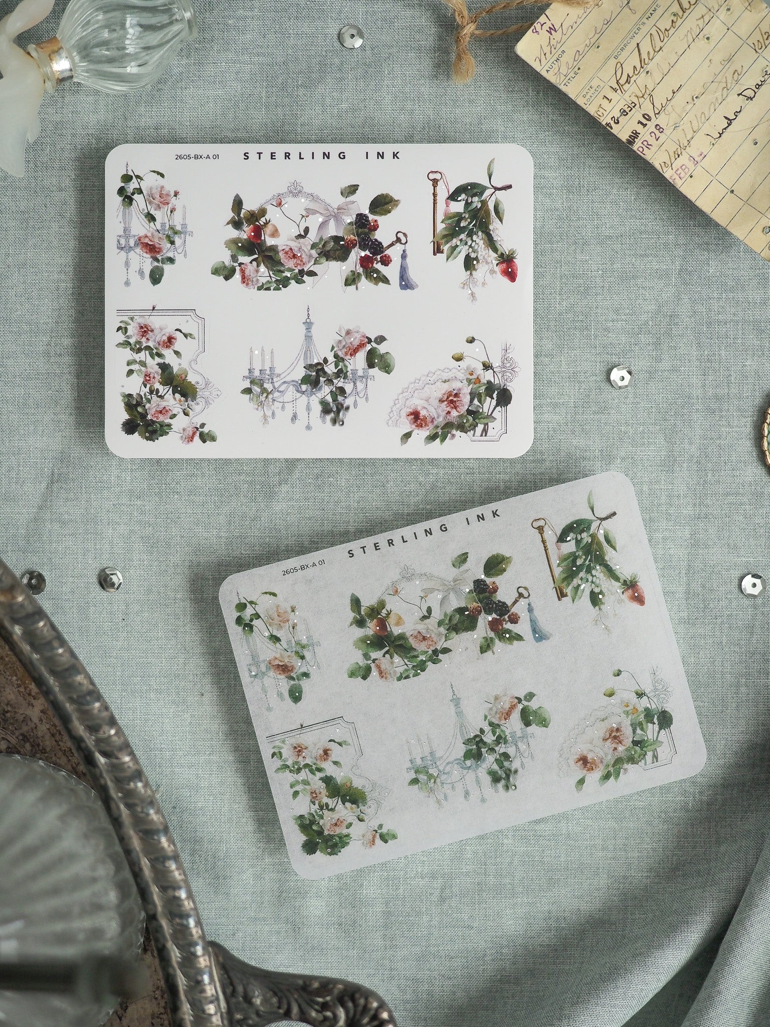 Watercolor sticker sets by Sterling Ink featuring romantic botanical clusters, lush roses, various greenery, and delicate vintage lace motifs for crafting and journaling.