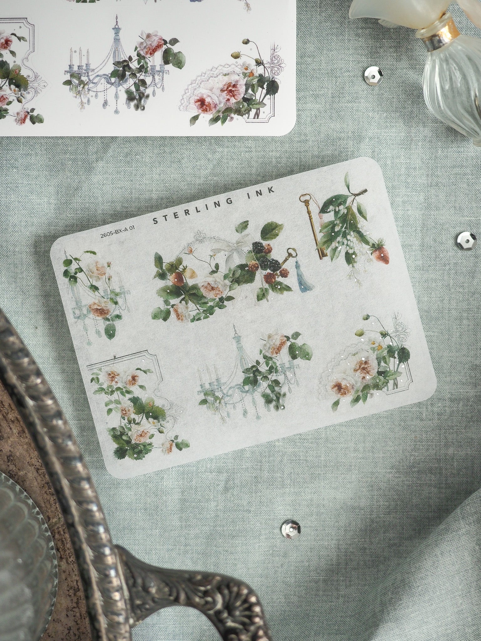 Watercolor sticker paper featuring romantic designs that combine Parisian architecture, including the Eiffel Tower, with delicate floral and botanical illustrations.