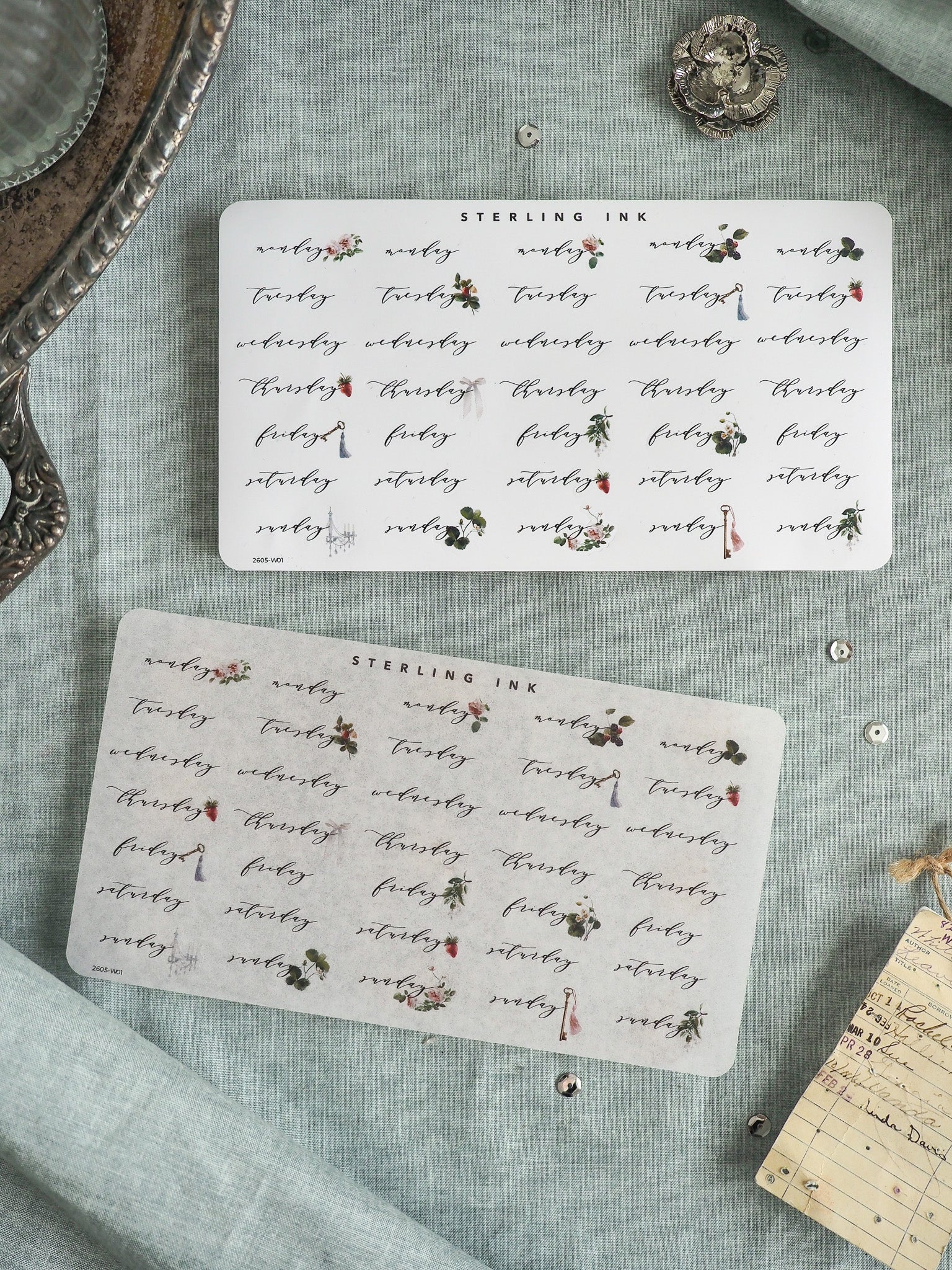 Set of two delicate, printable floral stickers from Sterling Ink, featuring repeating vintage patterns of small wildflowers and leaves on white paper.