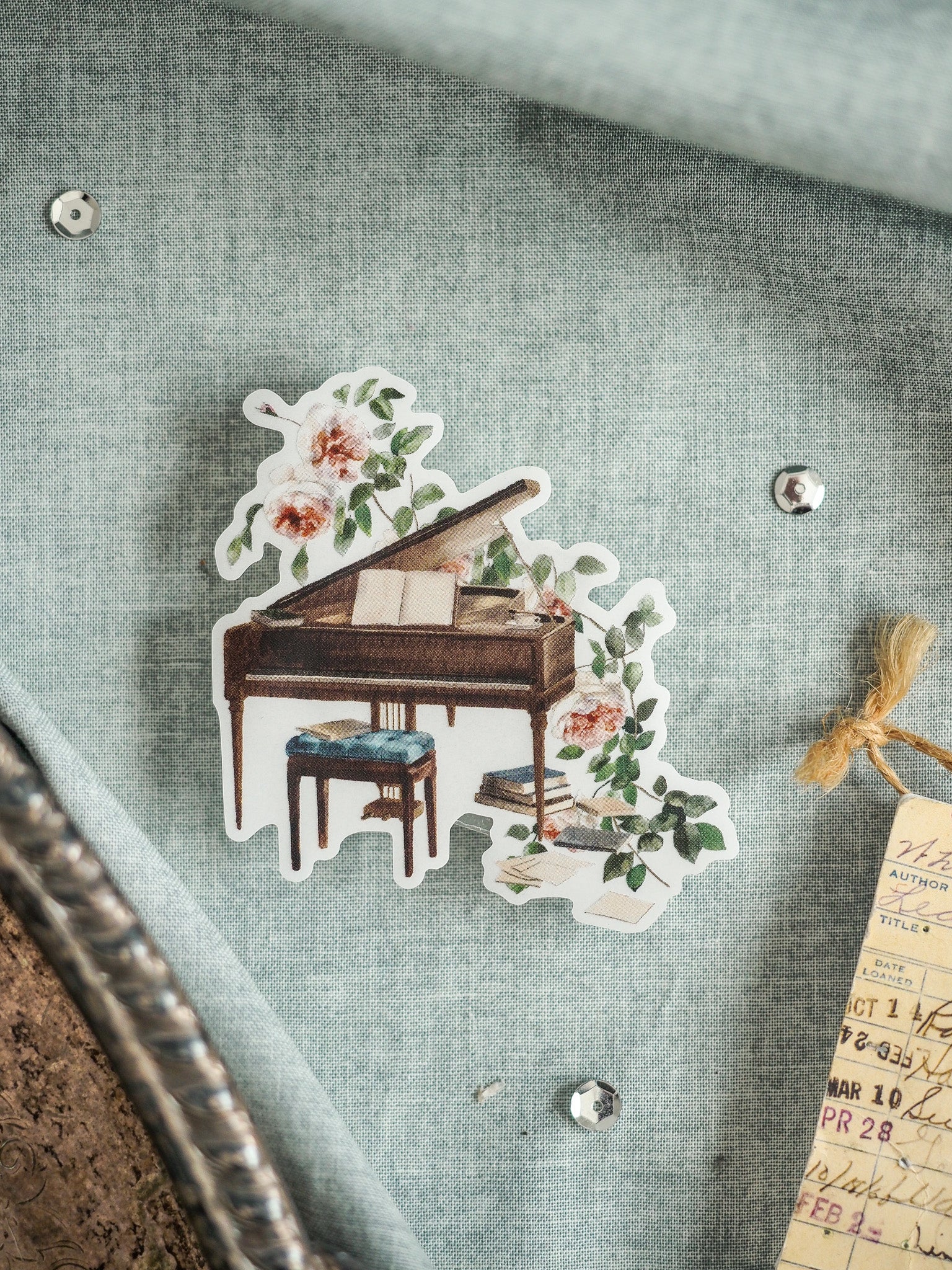 Vintage floral sticker decal featuring an antique writing desk with drawers, accented by realistic painted roses and greenery.