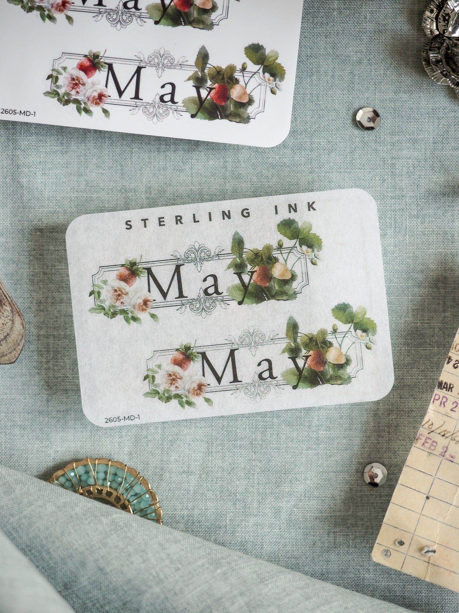 Sticker set featuring "June" and lush botanical wreaths with blush and green florals, perfect for spring crafting and scrapbooking decorations.