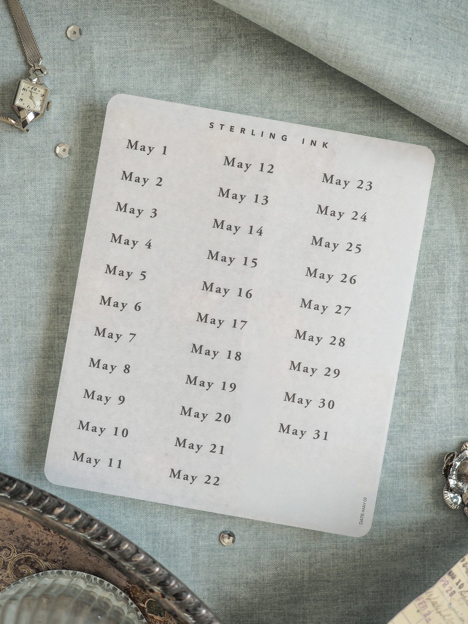 A clean, vertical monthly calendar card for June, featuring "Sterling Ink" printed in black text on a neutral cream background for event planning.