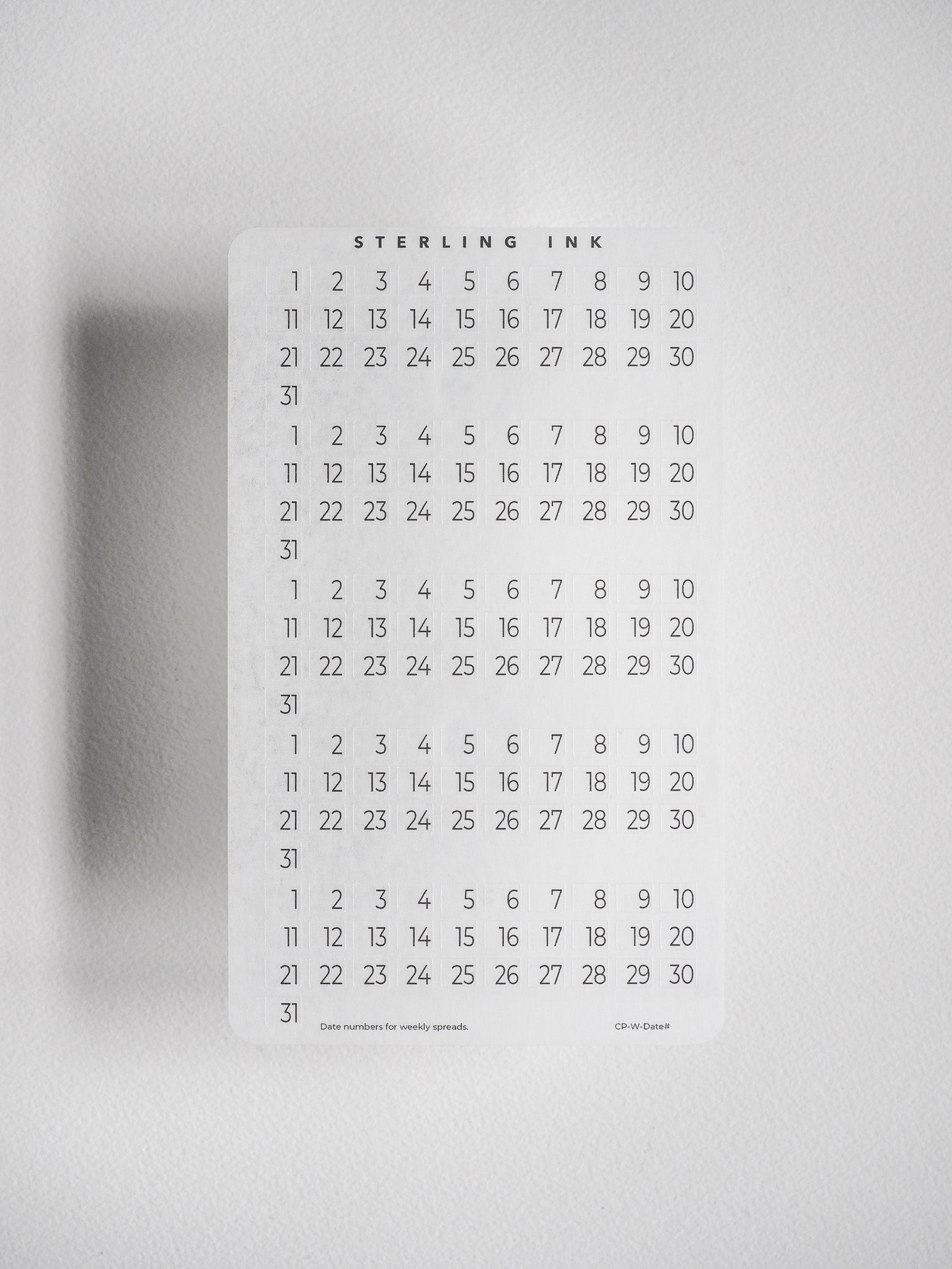 Structured black and white date grid sticker featuring sequential numbers 1 through 31, designed for weekly or monthly planner date number compatibility.