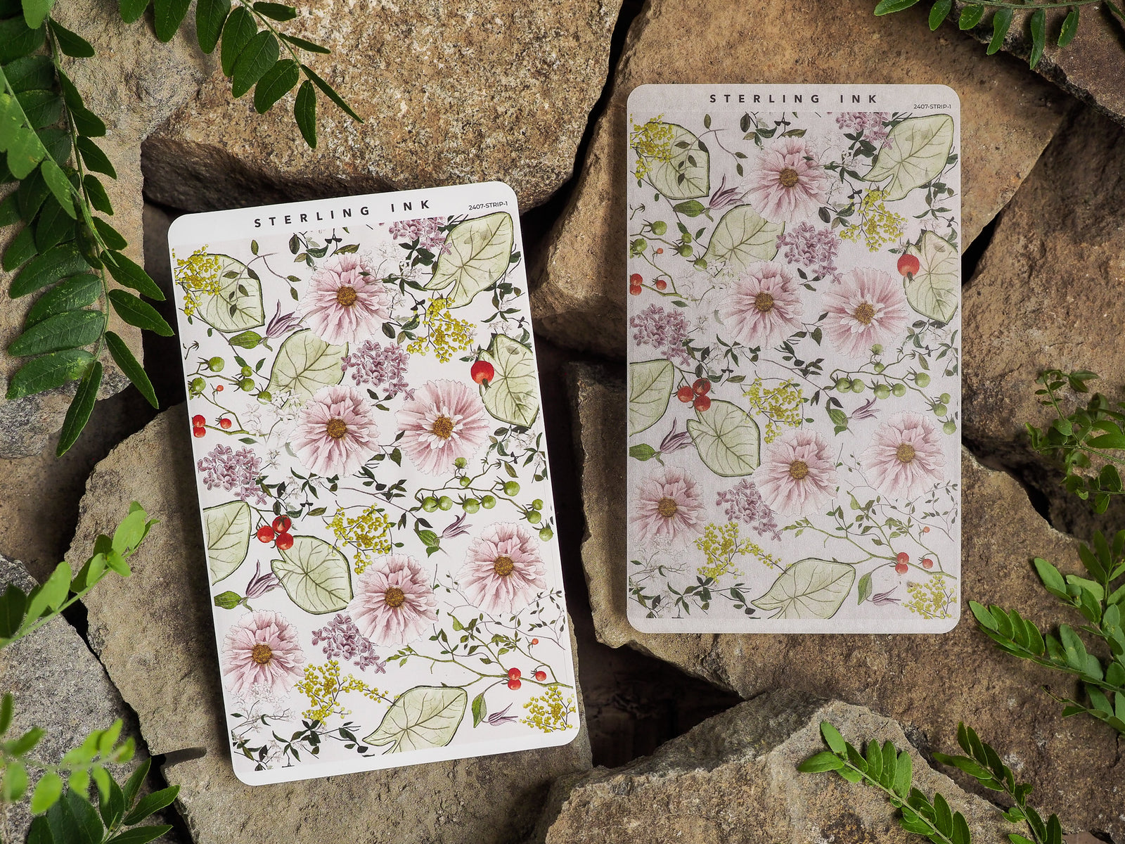 Elegant thin sticker strips featuring a delicate botanical pattern of blush pink, cream, and yellow dahlia blossoms, lush greenery, and scattered red berries.