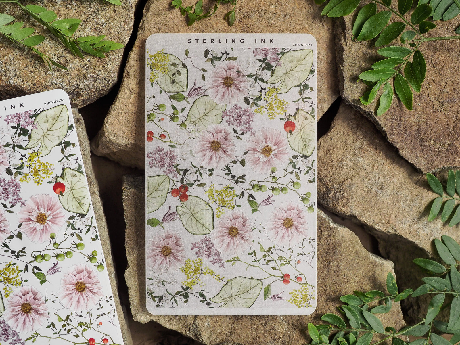Pastel floral strip stickers featuring a delicate meadow arrangement of blush pink roses, creamy white blooms, vibrant green foliage, and scattered red berries.