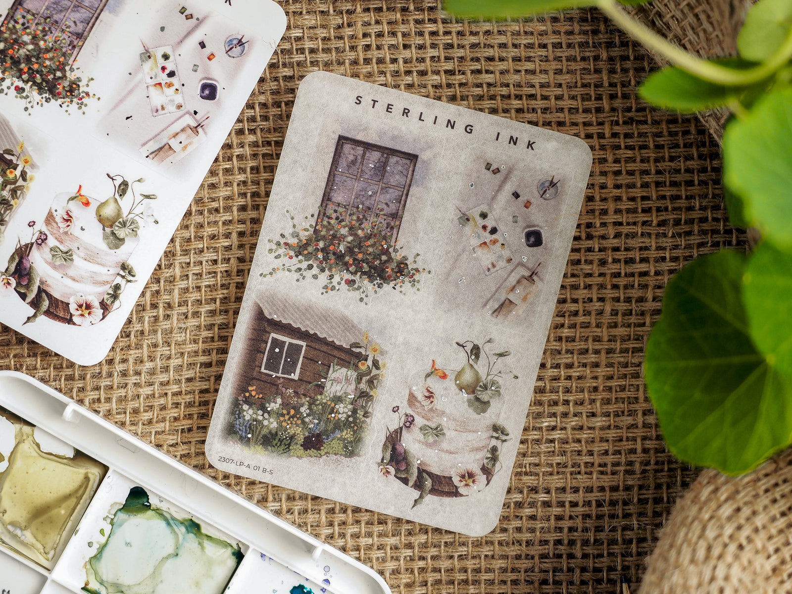 Whimsical sticker sheet featuring detailed, vintage illustrations of rustic cottages, overgrown floral bouquets, and antique architectural details.