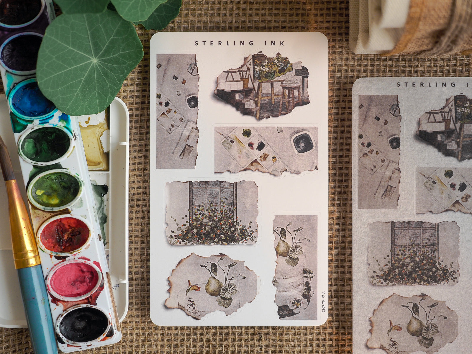 Vintage tear-away stickers featuring sepia-toned, aged paper designs of architectural vignettes, window details, and small potted plants for July 2023.