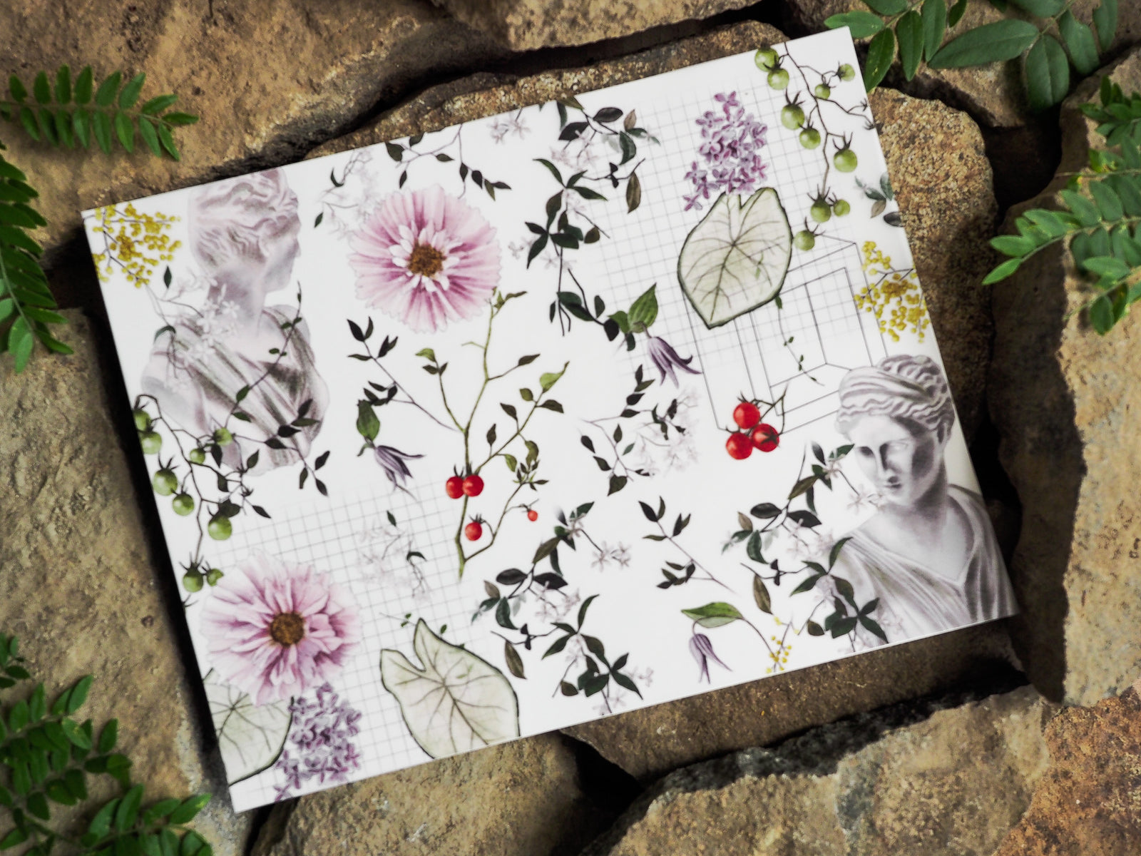 Botanical printable featuring soft floral bouquets, lush green leaves, scattered berries, and subtle charcoal illustrations set against a delicate grid pattern.