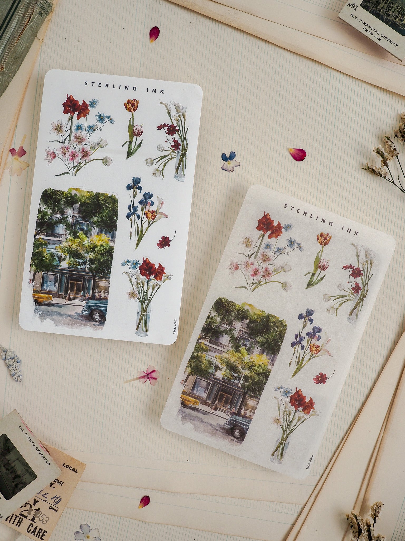 Coordinating watercolor art stickers featuring vibrant floral bouquets and a nostalgic graphic rendering of a city street corner.