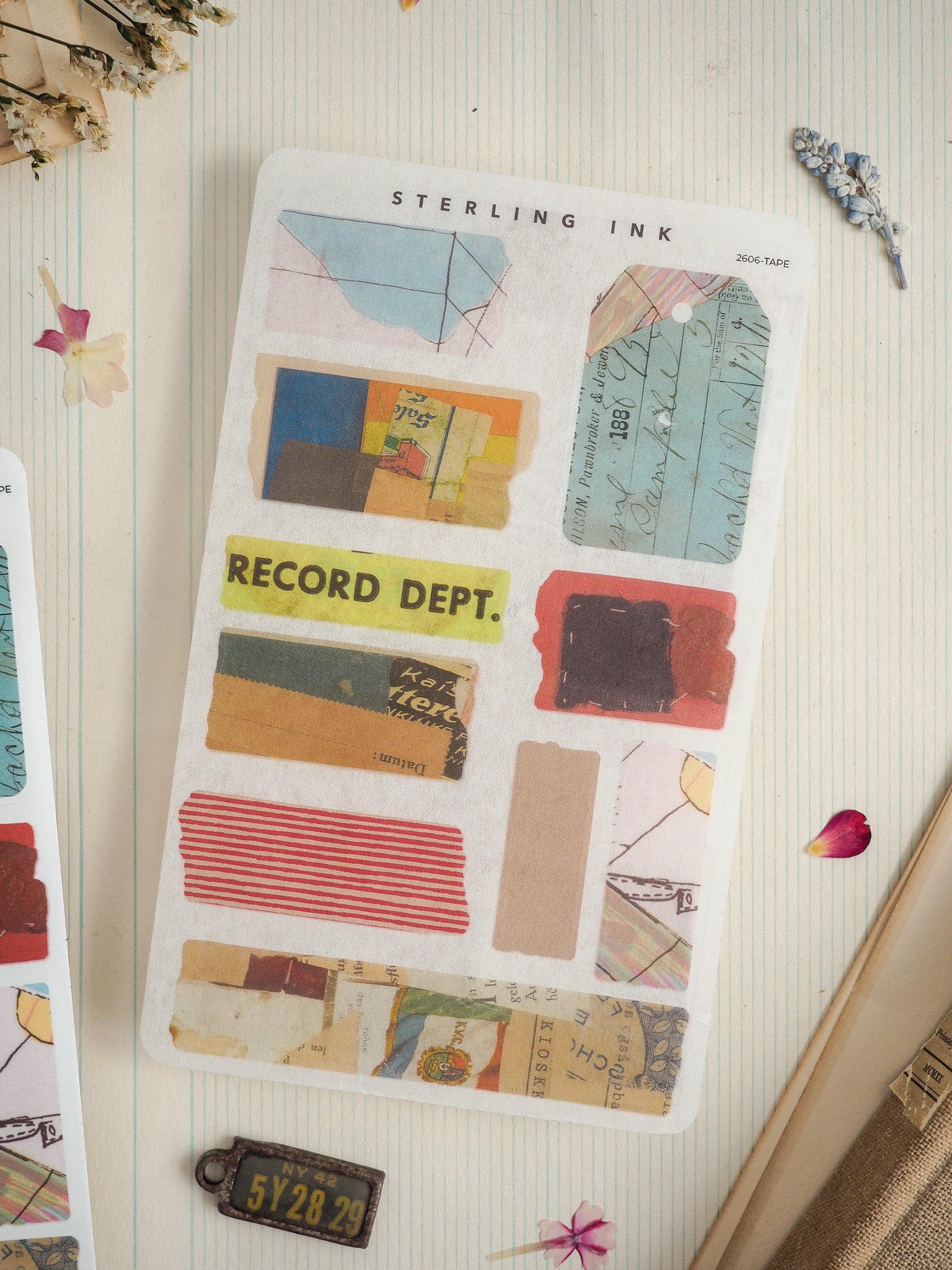 Vintage "Sterling Ink" record label sticker sheet featuring distressed stamps, filing tabs, and "RECORD DEPT." labels for a nostalgic archival or office aesthetic.