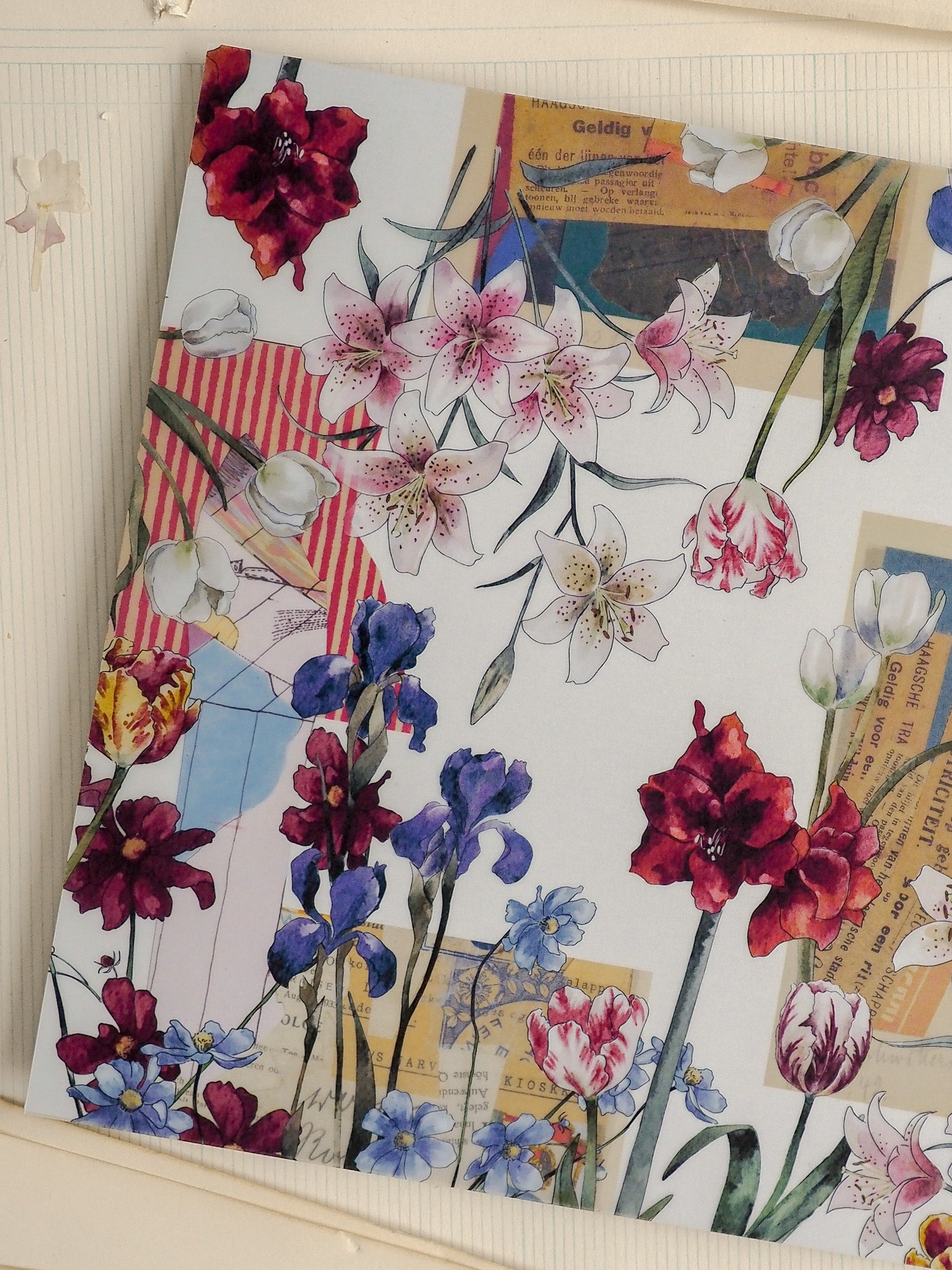 Lush watercolor floral pattern featuring a dense botanical arrangement of white, pink, and deep red lilies, orchids, and varied blossoms.