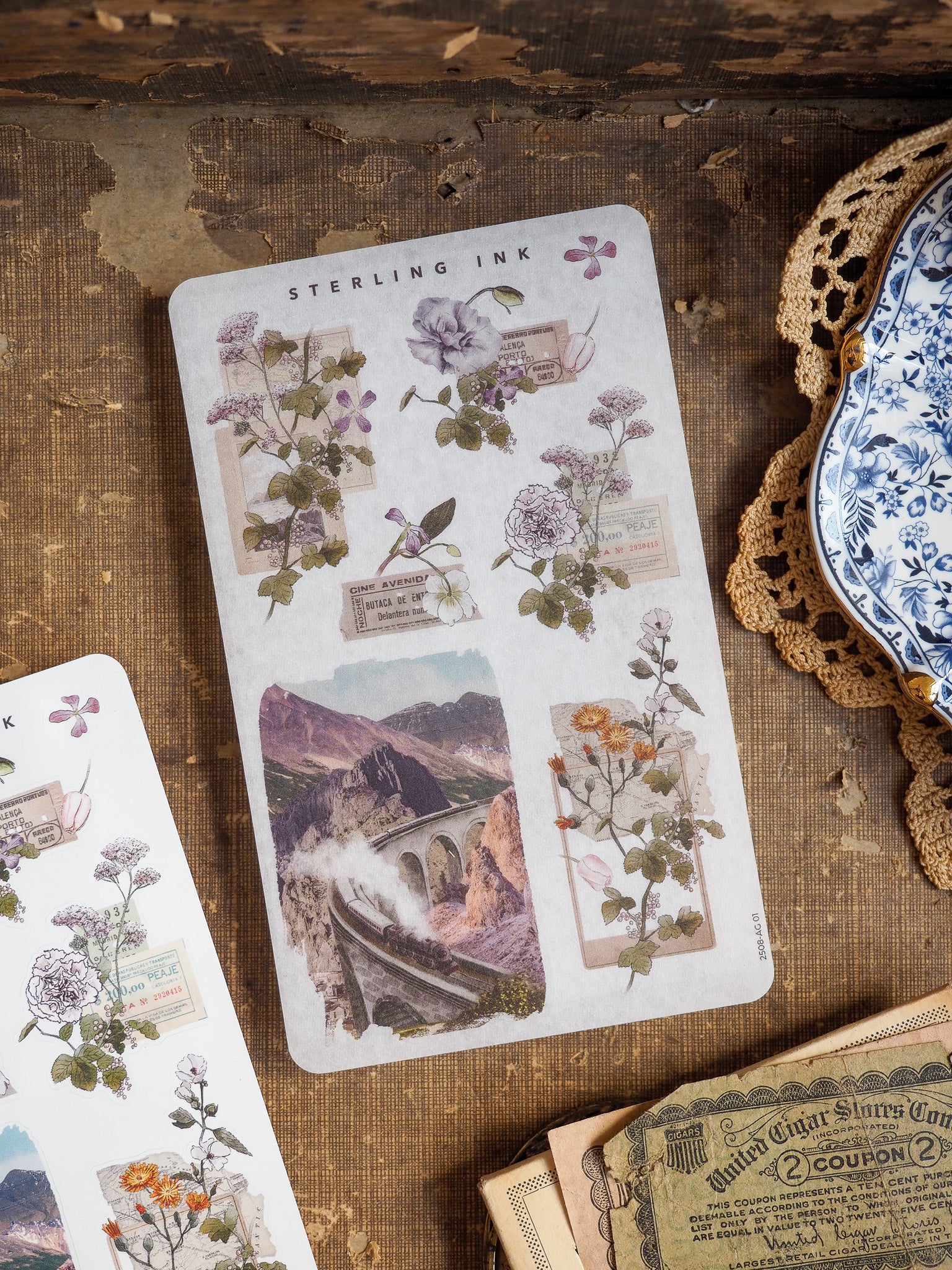Vintage floral sticker sheet featuring arrangements of soft pastel botanical blooms, delicate watercolor florals, and a rustic stone archway vignette perfect for journaling.