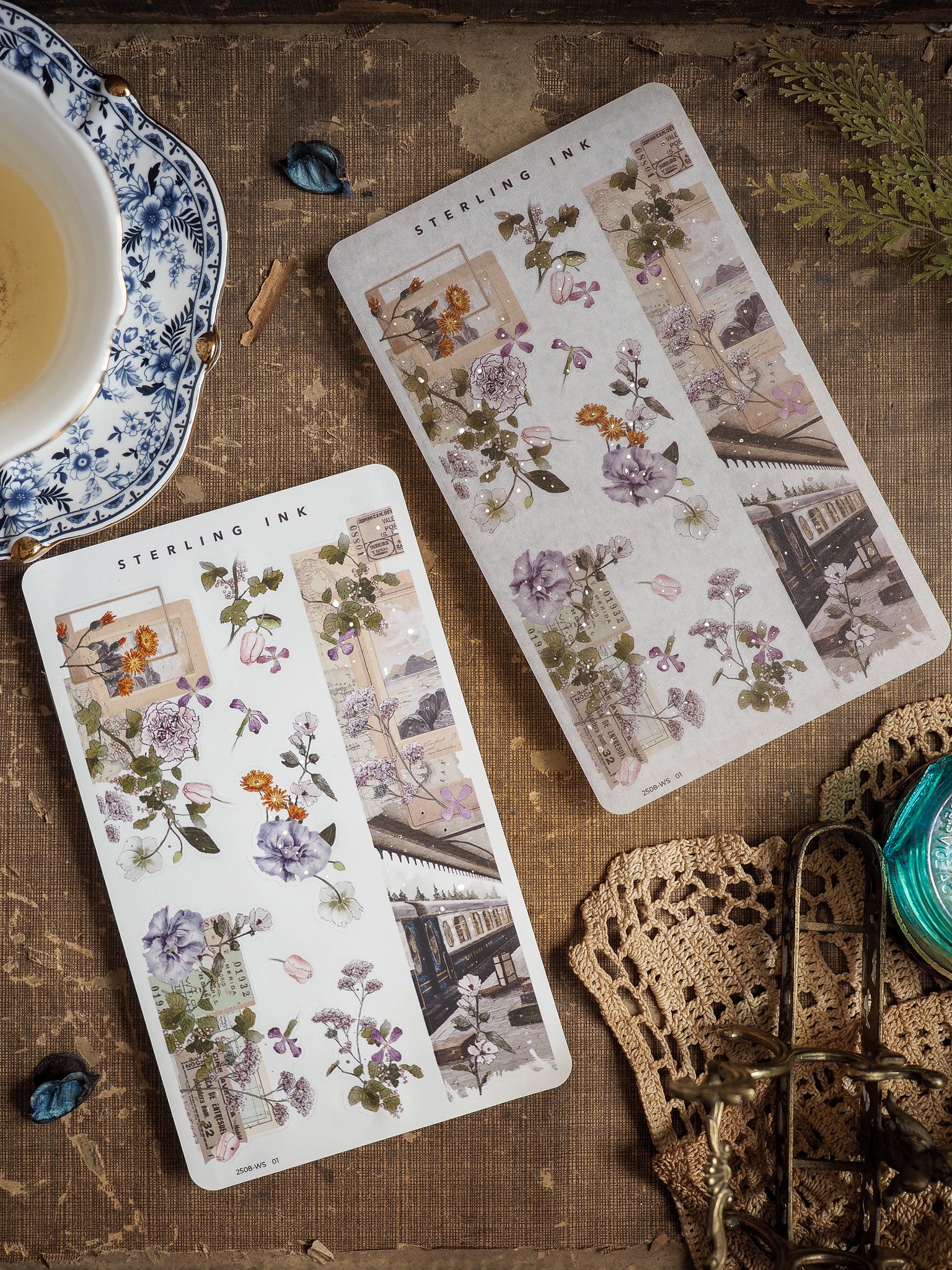 Vintage sticker strips featuring a botanical collage design of muted purple flowers, sepia-toned illustrations, and antique architectural sketches.