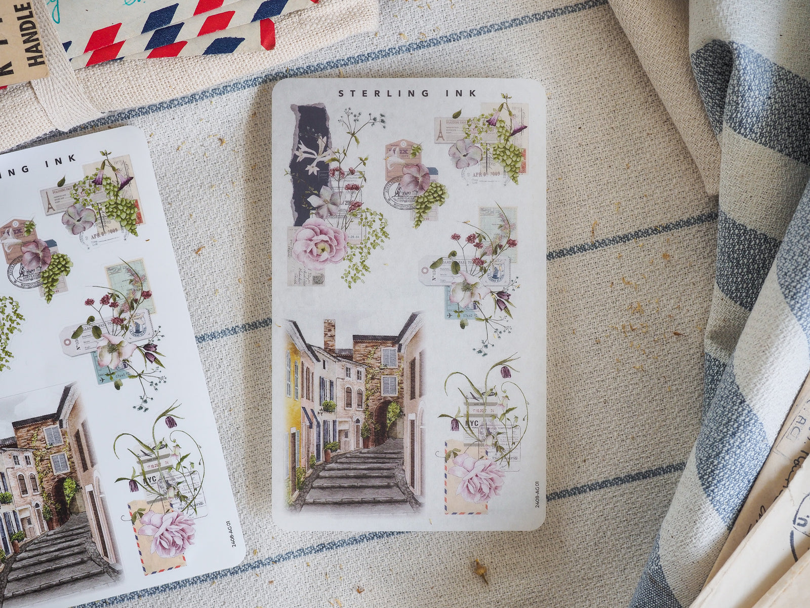 Decorative sticker sheet featuring vintage floral arrangements and charming watercolor buildings, perfect for August 2024 crafting and journaling.