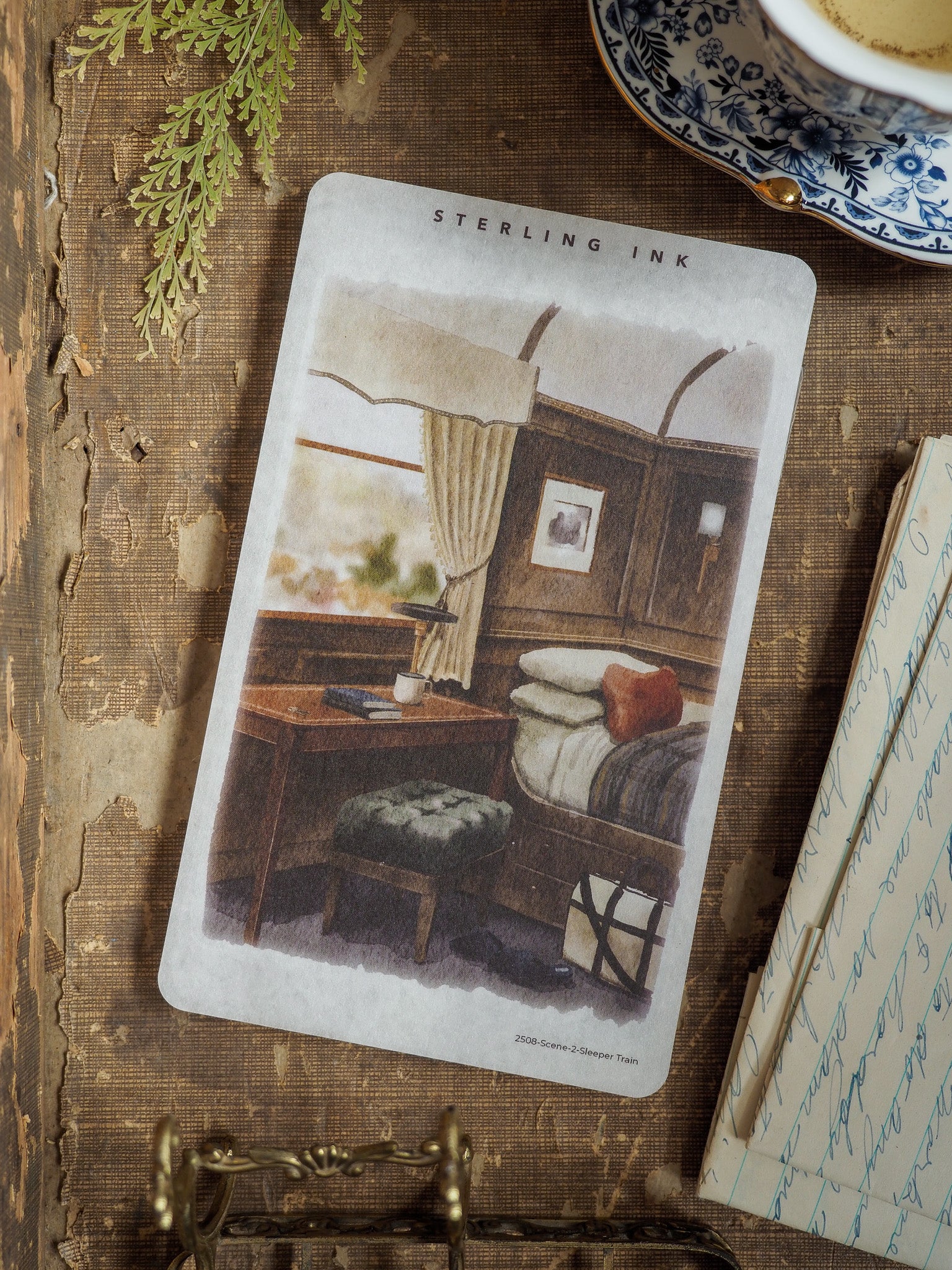 Vintage illustration sticker of a cozy train sleeper cabin interior, featuring a draped four-poster bed, detailed dressing table, and rich, antique colors.